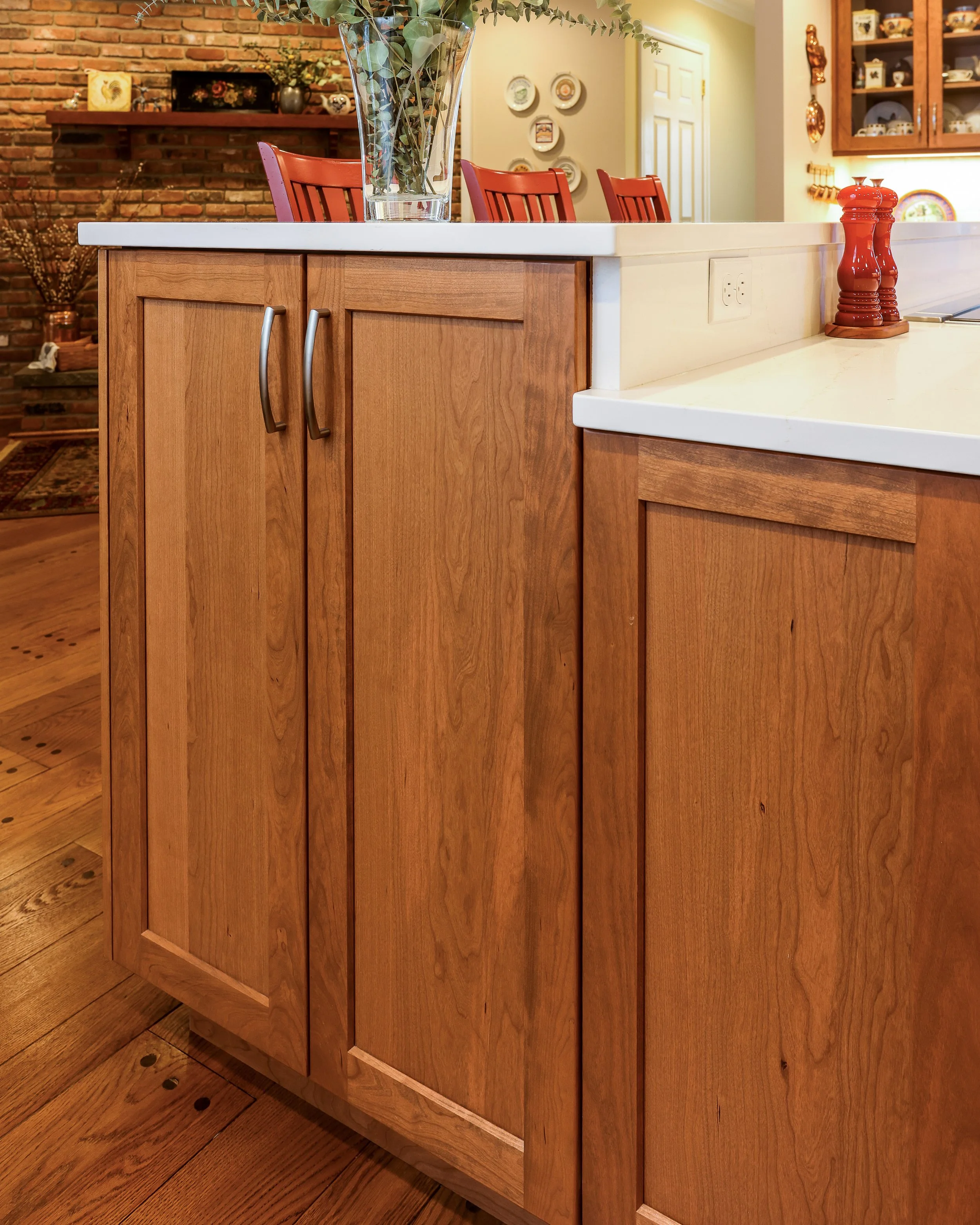 close-up of the cabinets under a two-tiered island