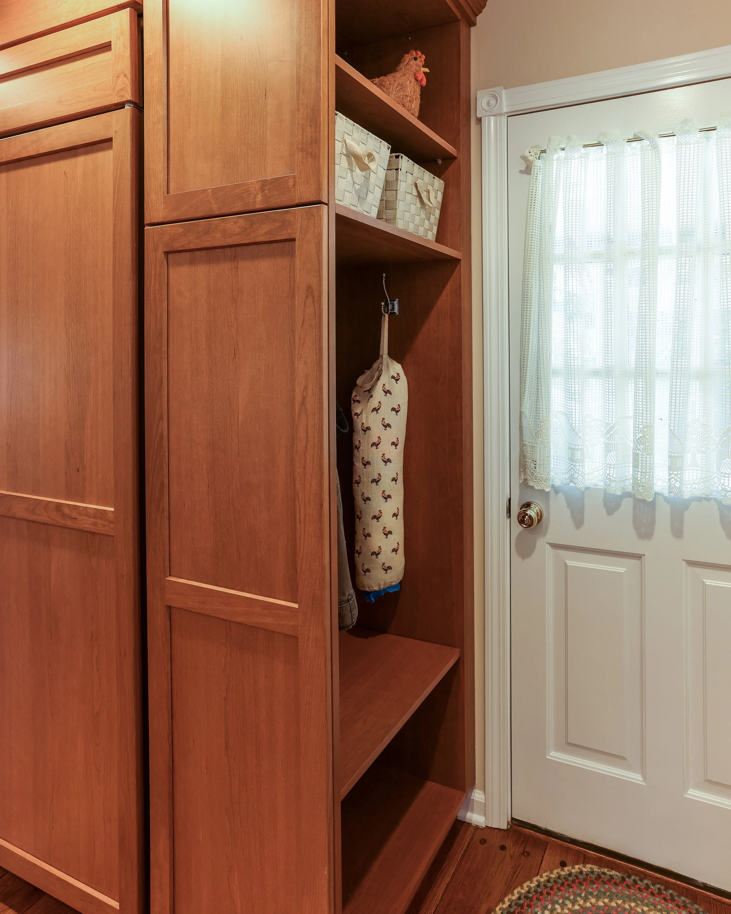 back entryway to the kitchen with open shelving