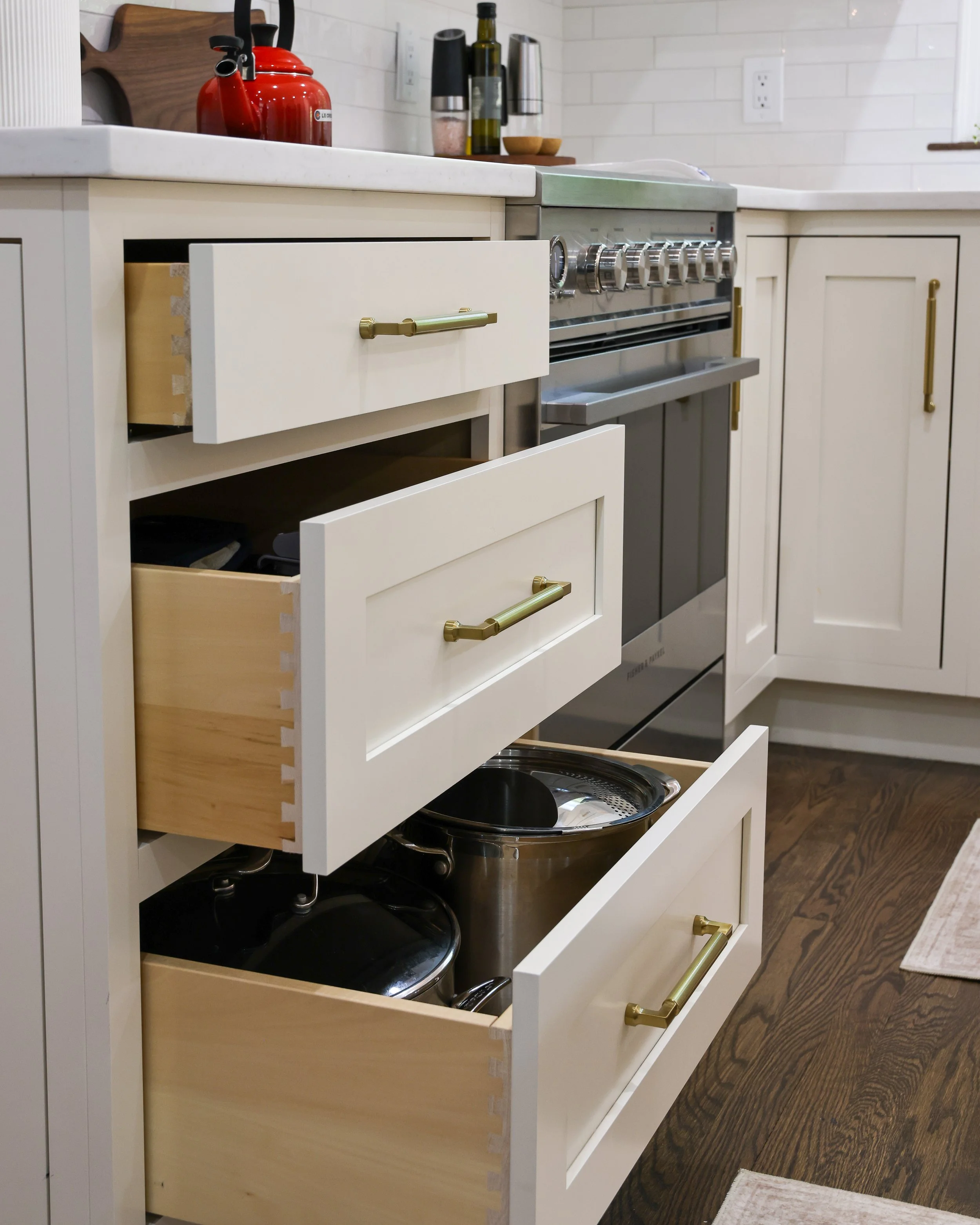 three pullout drawers in a kitchen