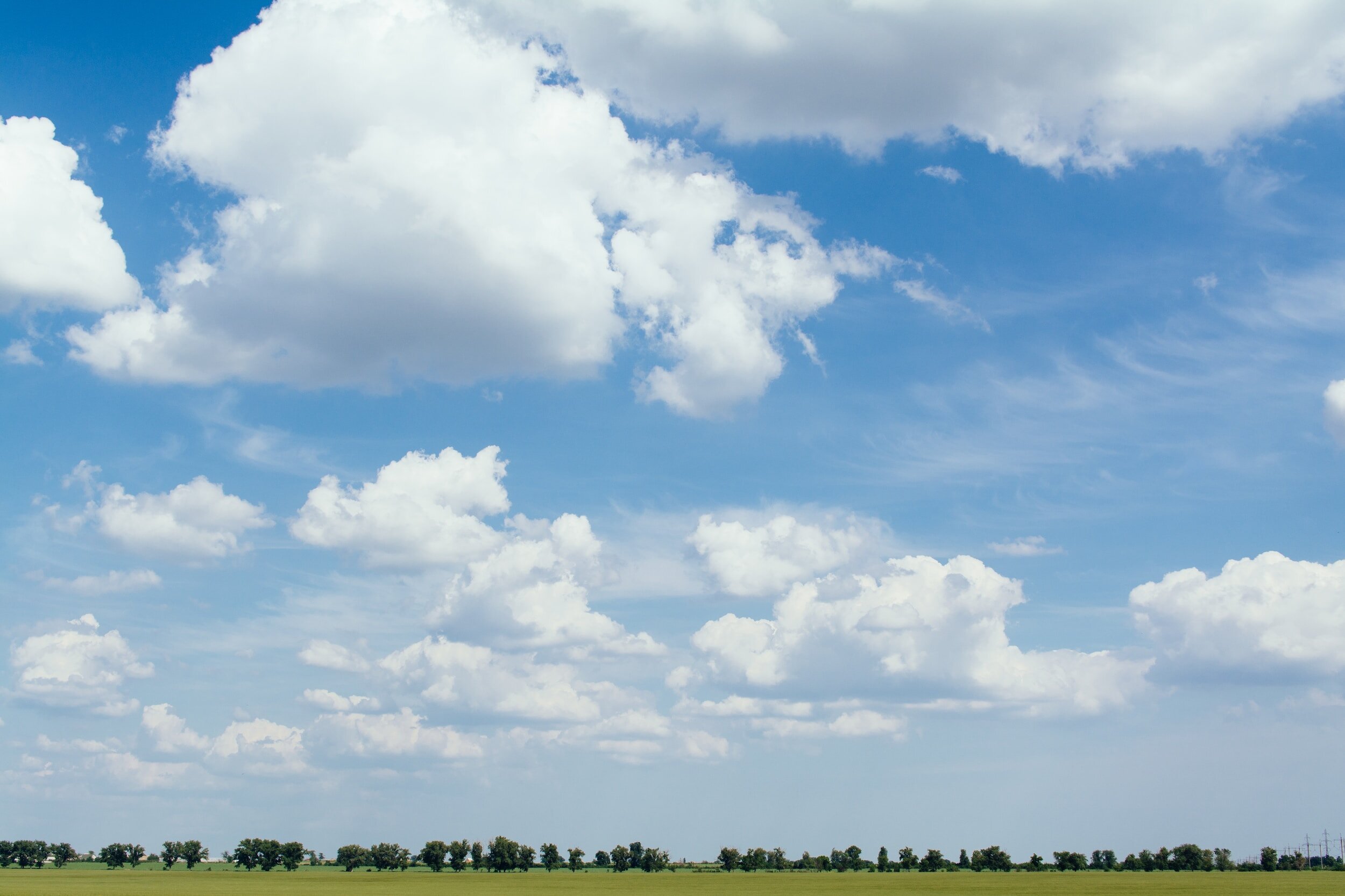 Perfect blue sky with wispy clouds
