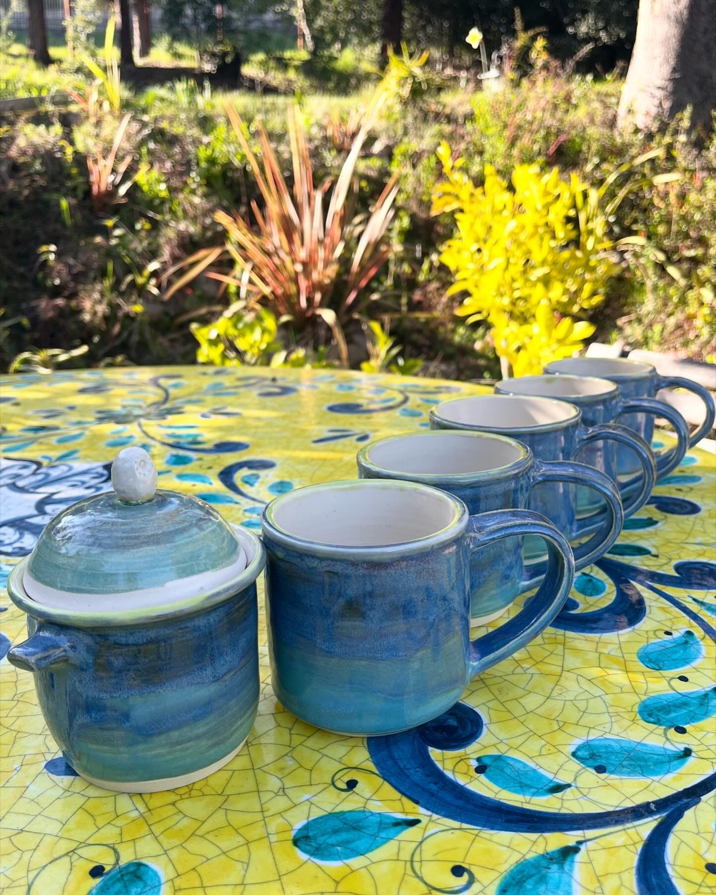 Blue/green mugs and sugar bowl
