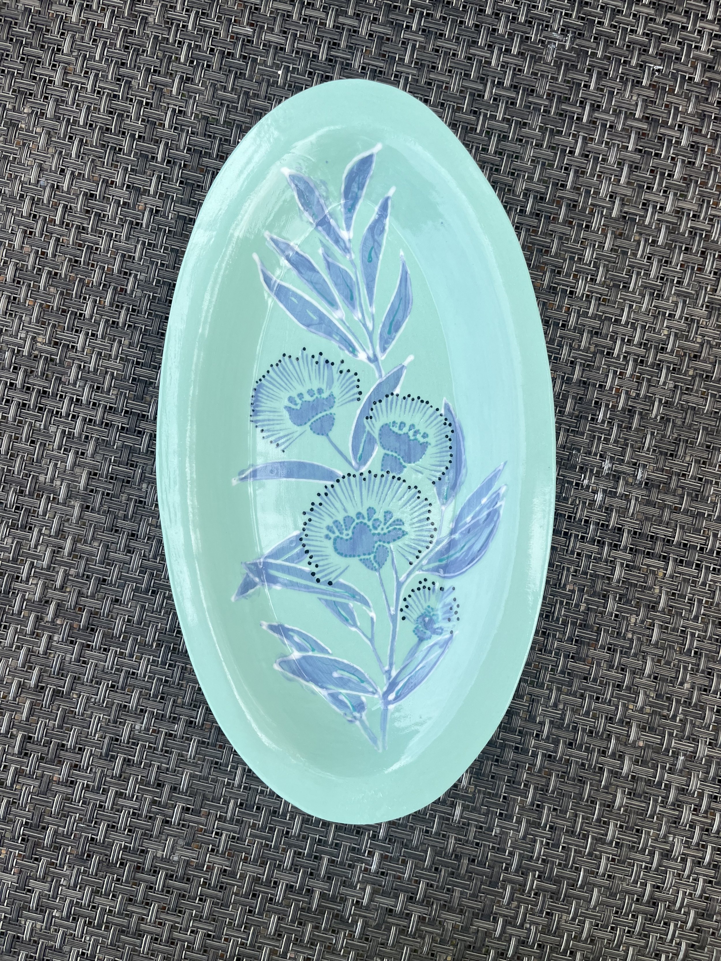 Turquoise dish with thistles