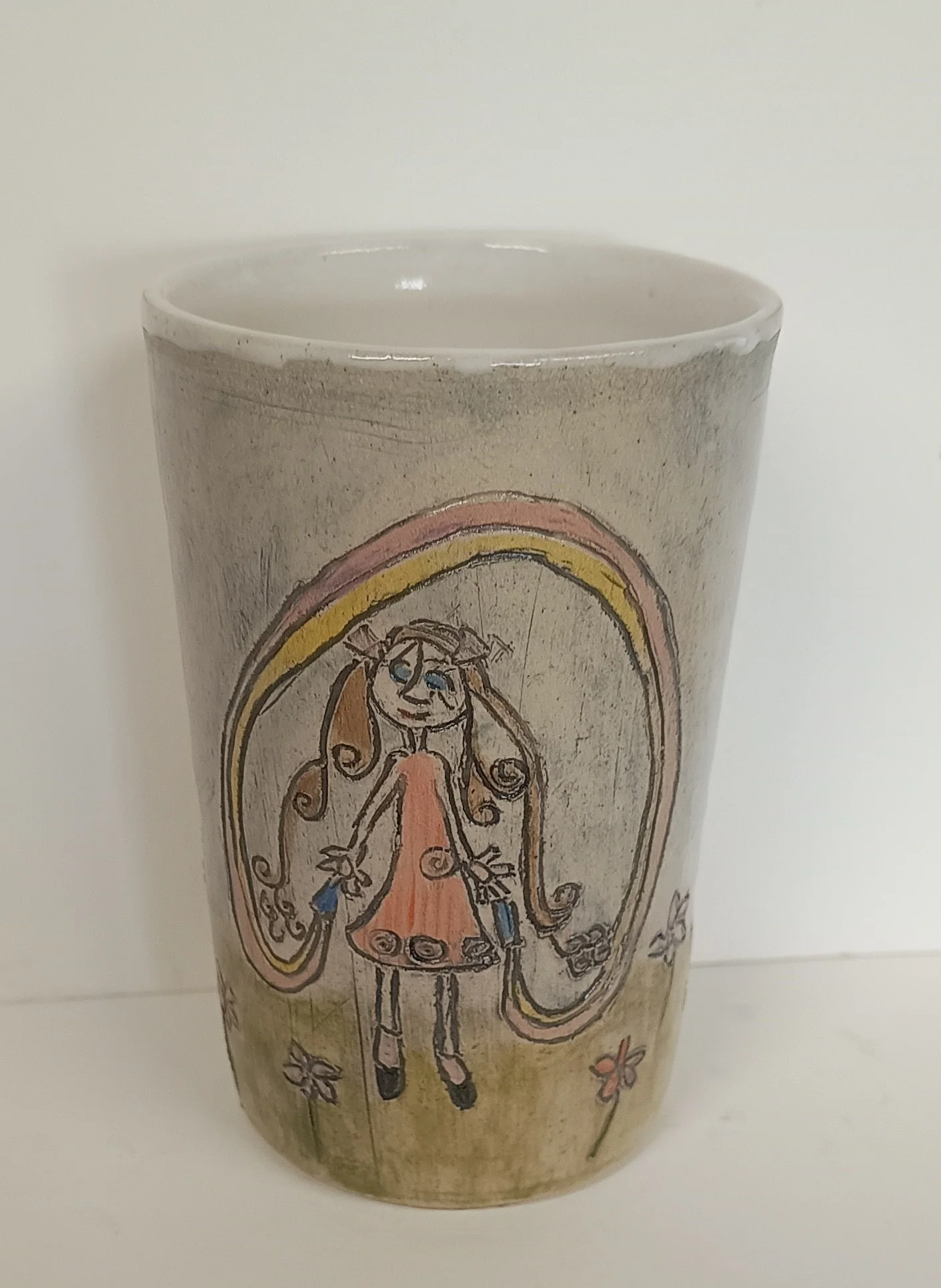 Favourite child's drawing onto a stoneware beaker. Priced individually. 