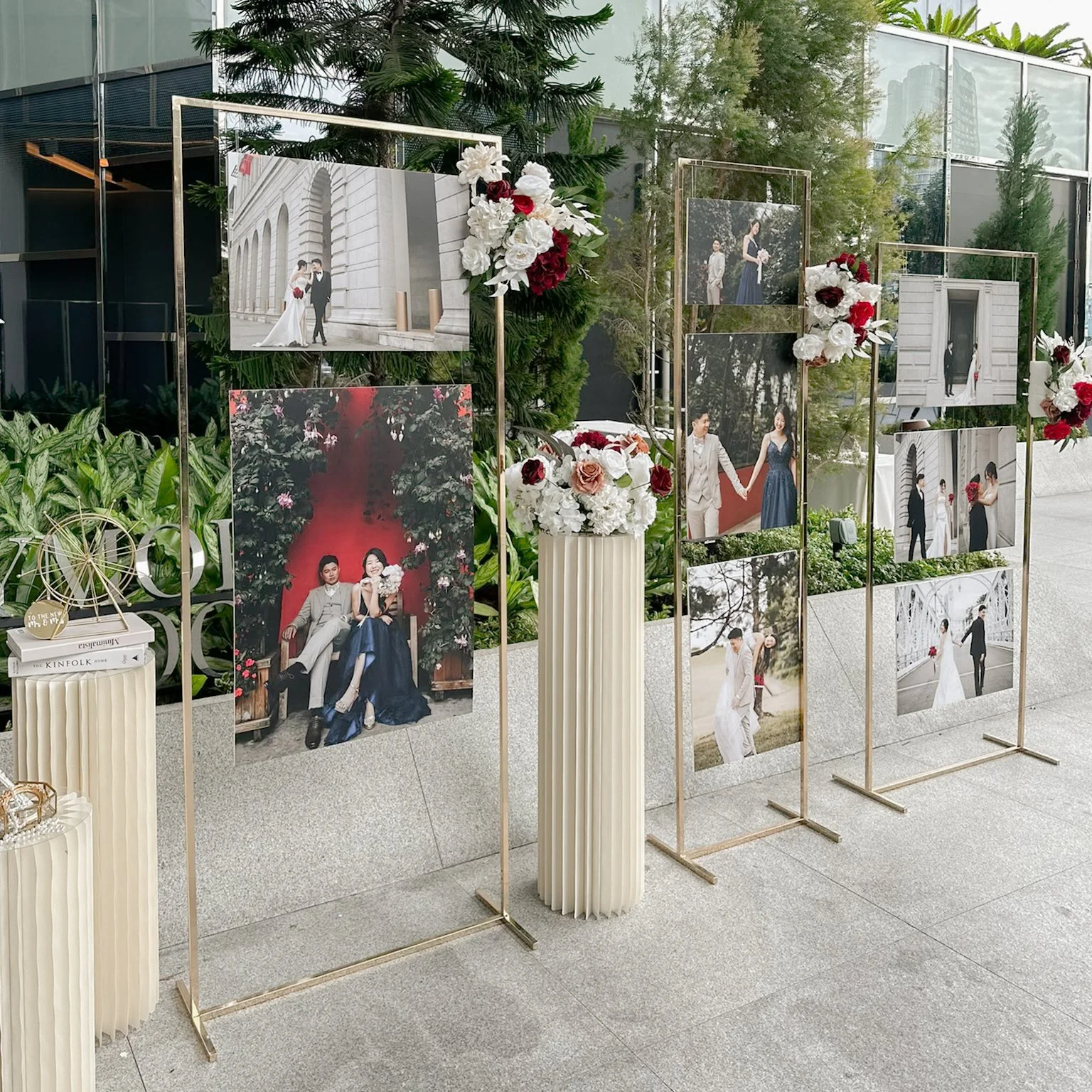 Wedding gold gallery stands in red and white faux florals at Pan Pacific Singapore
