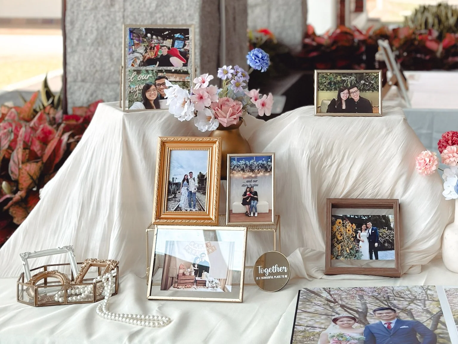 Photo display table and props for a wedding in Singapore