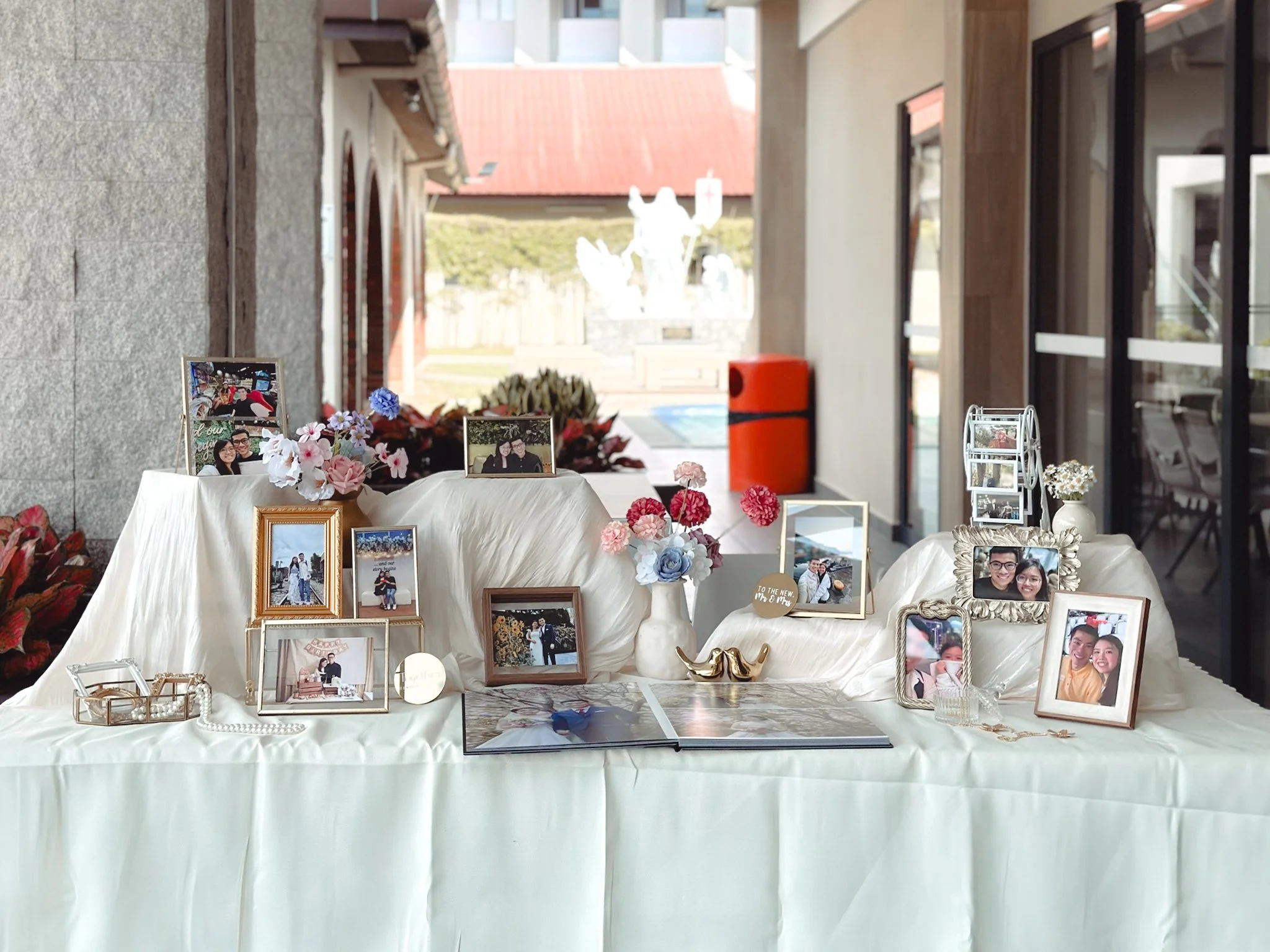 Photo display table and props for a wedding in Singapore