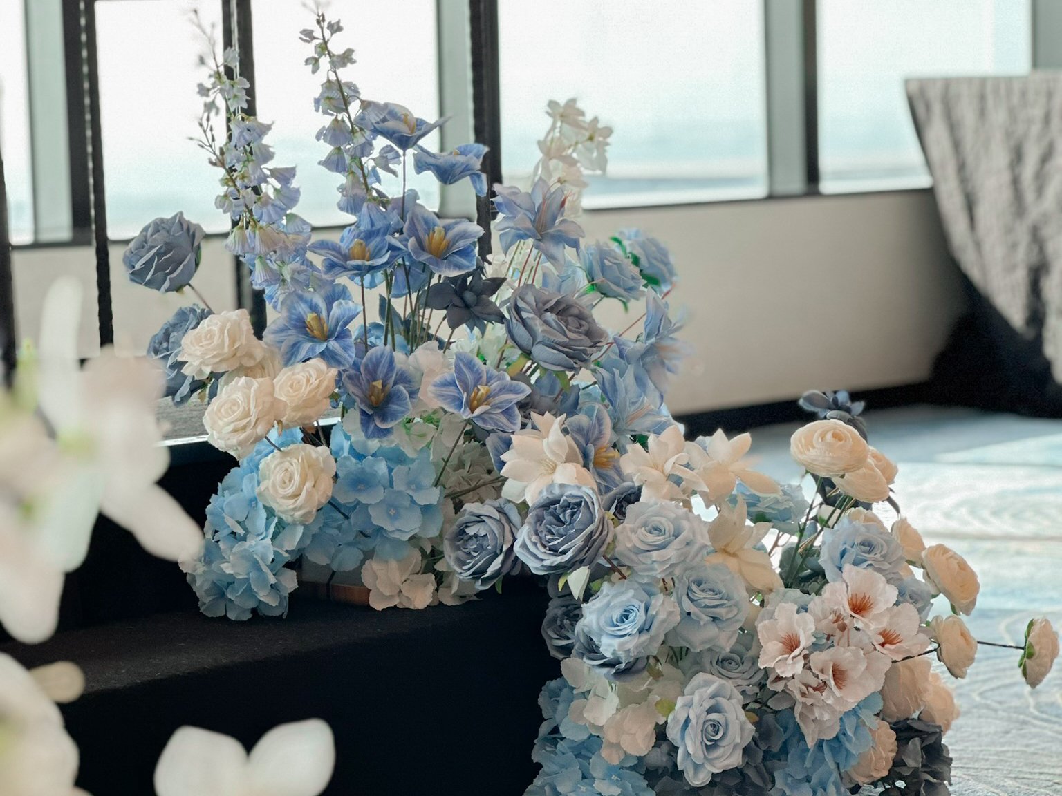 Blue and White faux floral hedge stage flowers for a wedding at Tower Club Singapore Ba Xian wedding decorations wedding decor