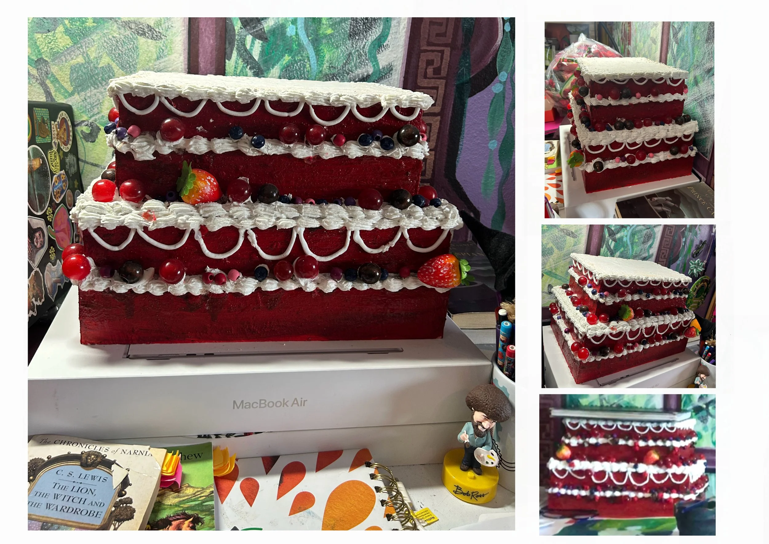 Large faux red velvet cake used as a Laptop stand/display