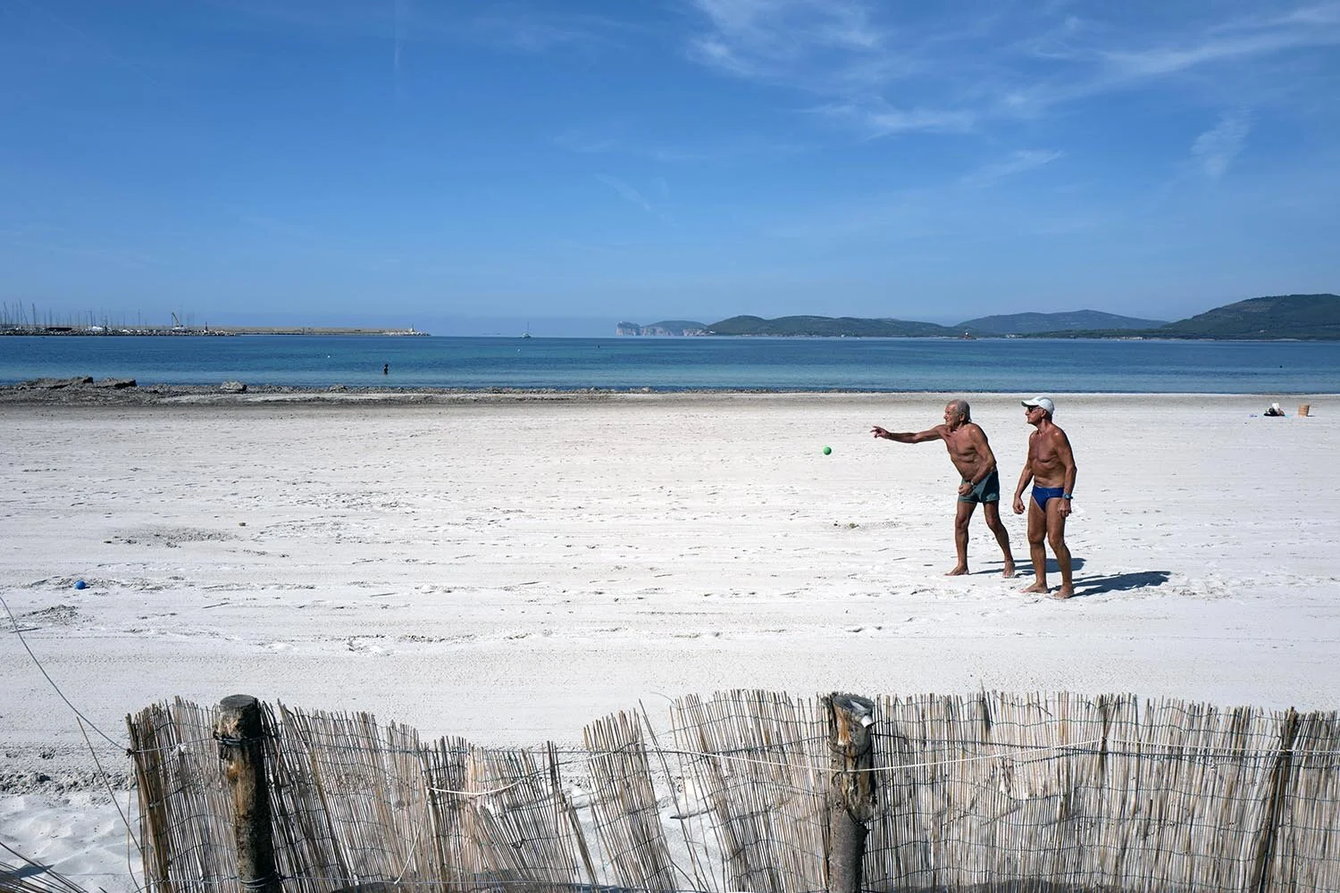 Men on beach Sardinia.jpg