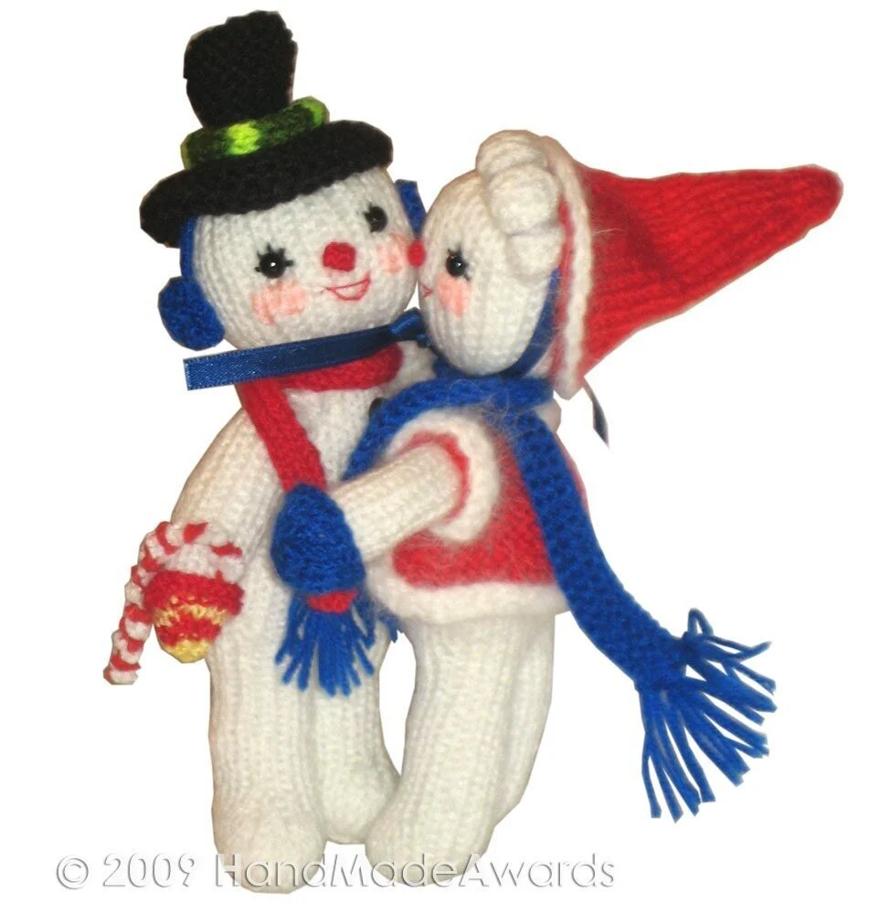 Mr and Mrs Snowman are singing Christmas Carol Knit Pattern