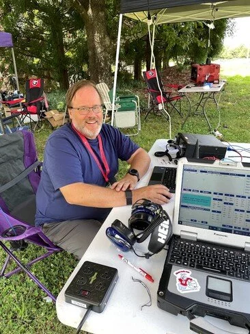Colin KO4IZK working radios at Field Day 2023.