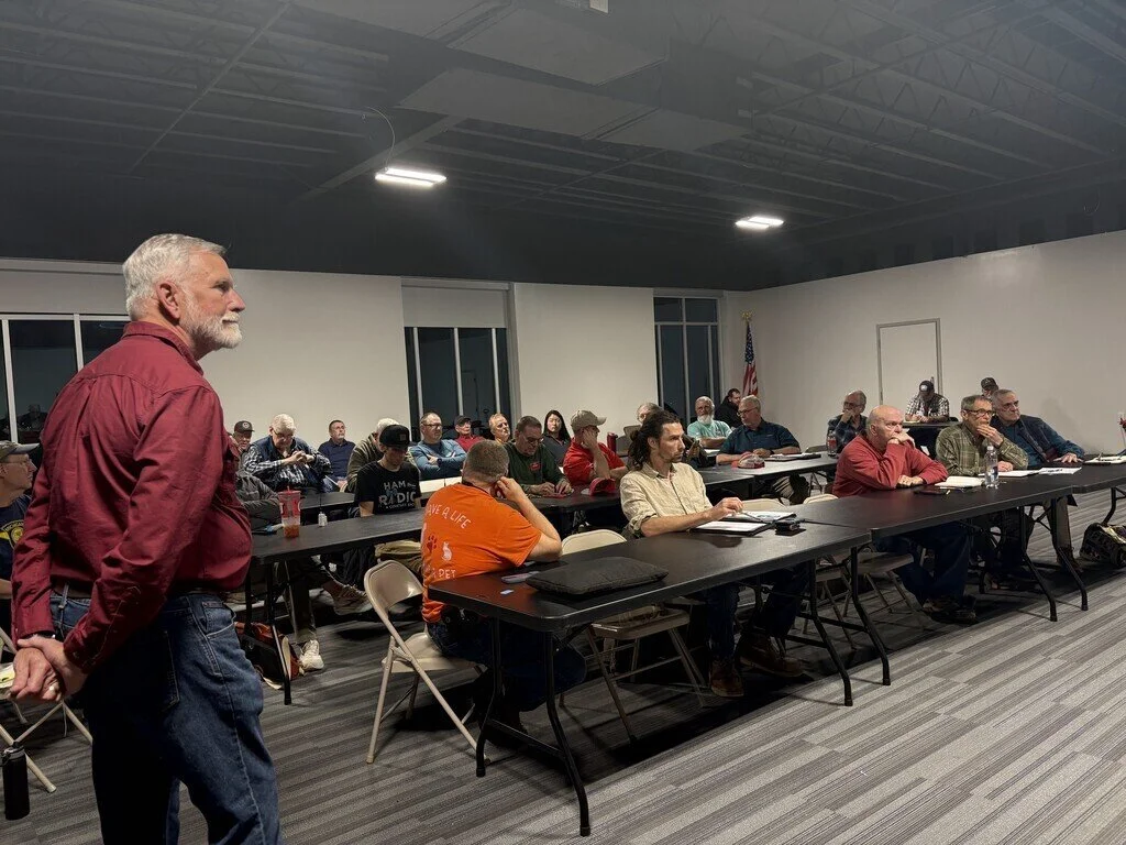 Claude (AC4SH), club President, oversees club meeting at the Athens Airport, January 2026.