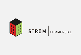 Logo for STROM Commercial featuring a 3D cube with red, black, and green sides, and the company name in black and green text.