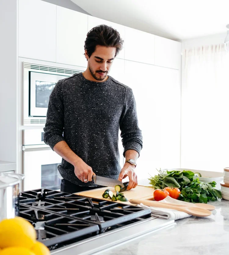 Man preparing food in kitchen