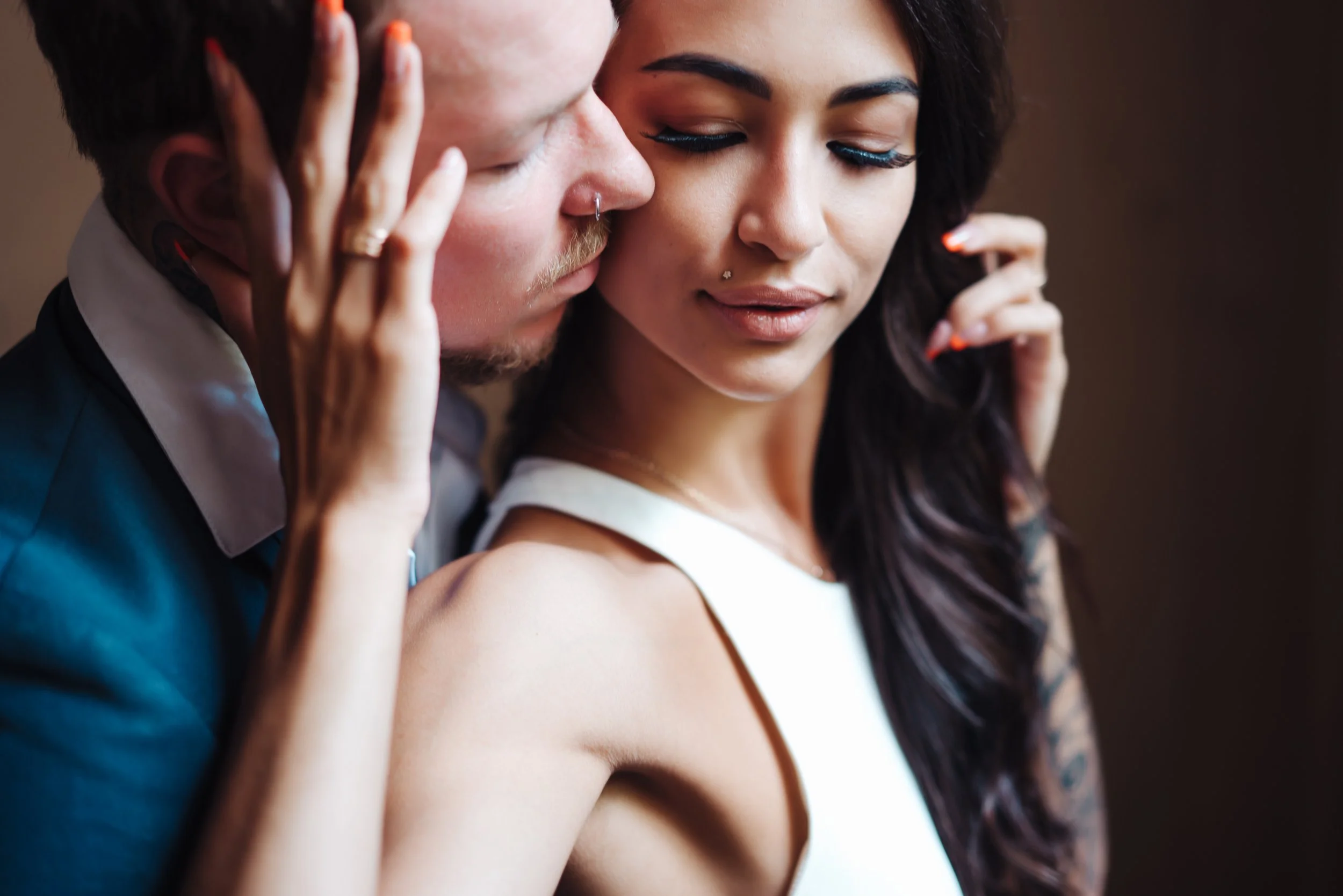 beautiful-young-couple-posing-on-camera-indoors-2023-11-27-04-52-18-utc.jpg