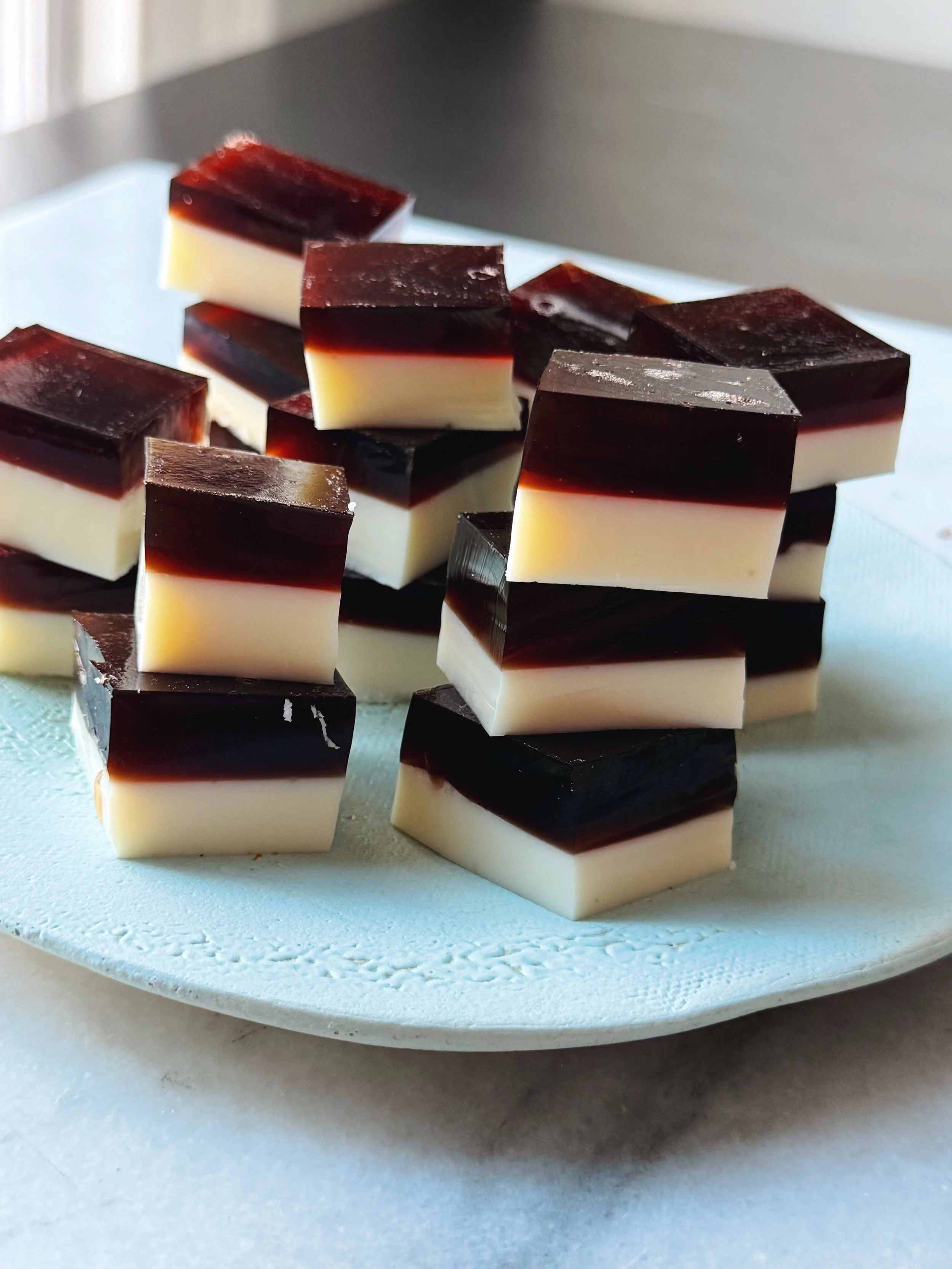 Cassis and cardamom milk jellies