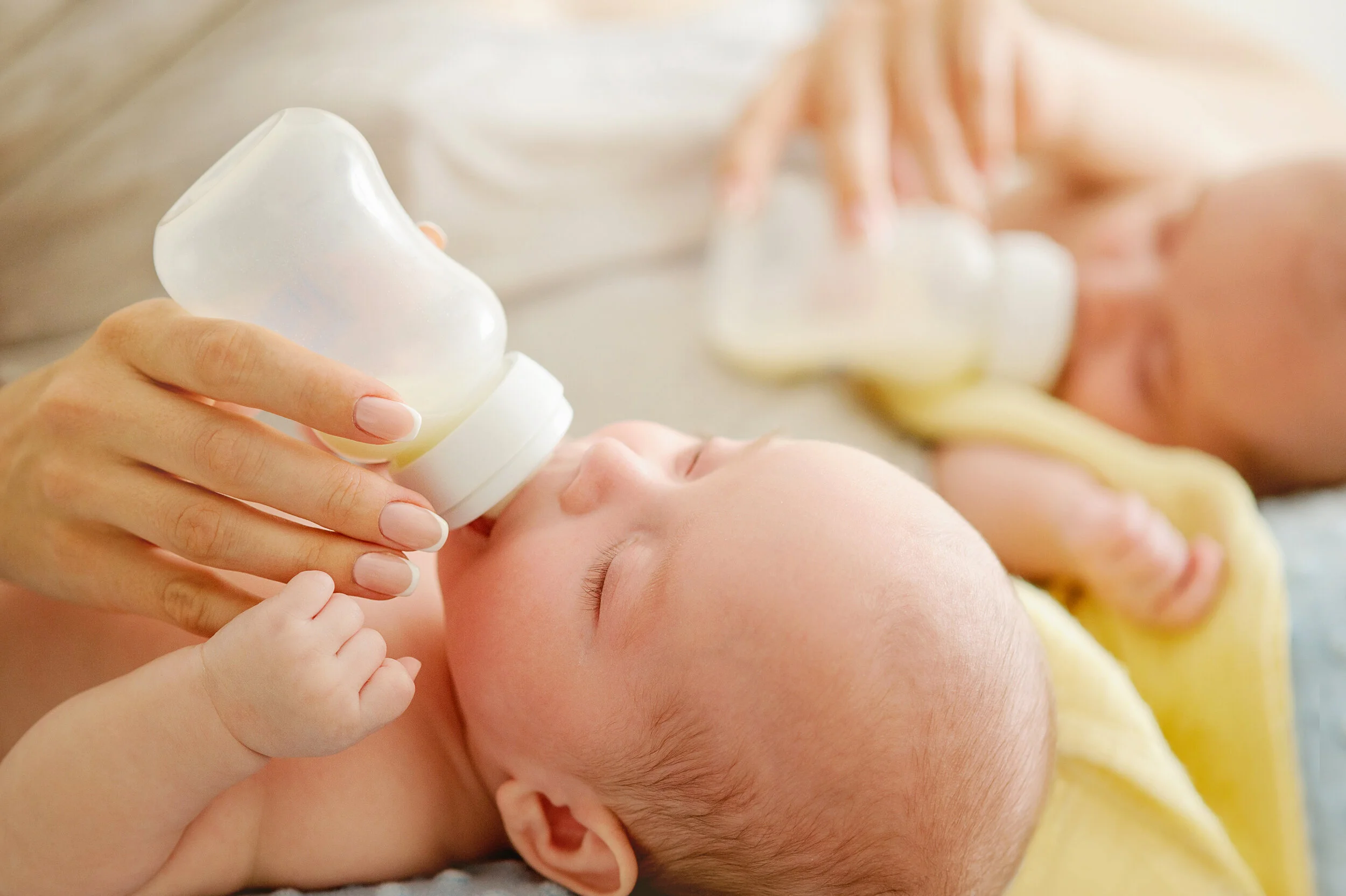 Adobe twin bottle feeding.jpeg