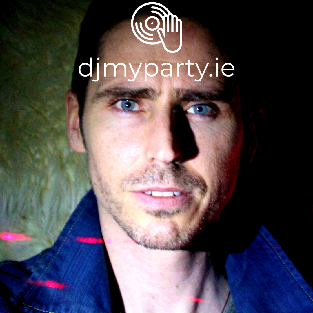 Close-up of a person with blue eyes and stubble, wearing a dark jacket, against a textured background. The upper part of the image has a logo and text saying "djmyparty.ie."