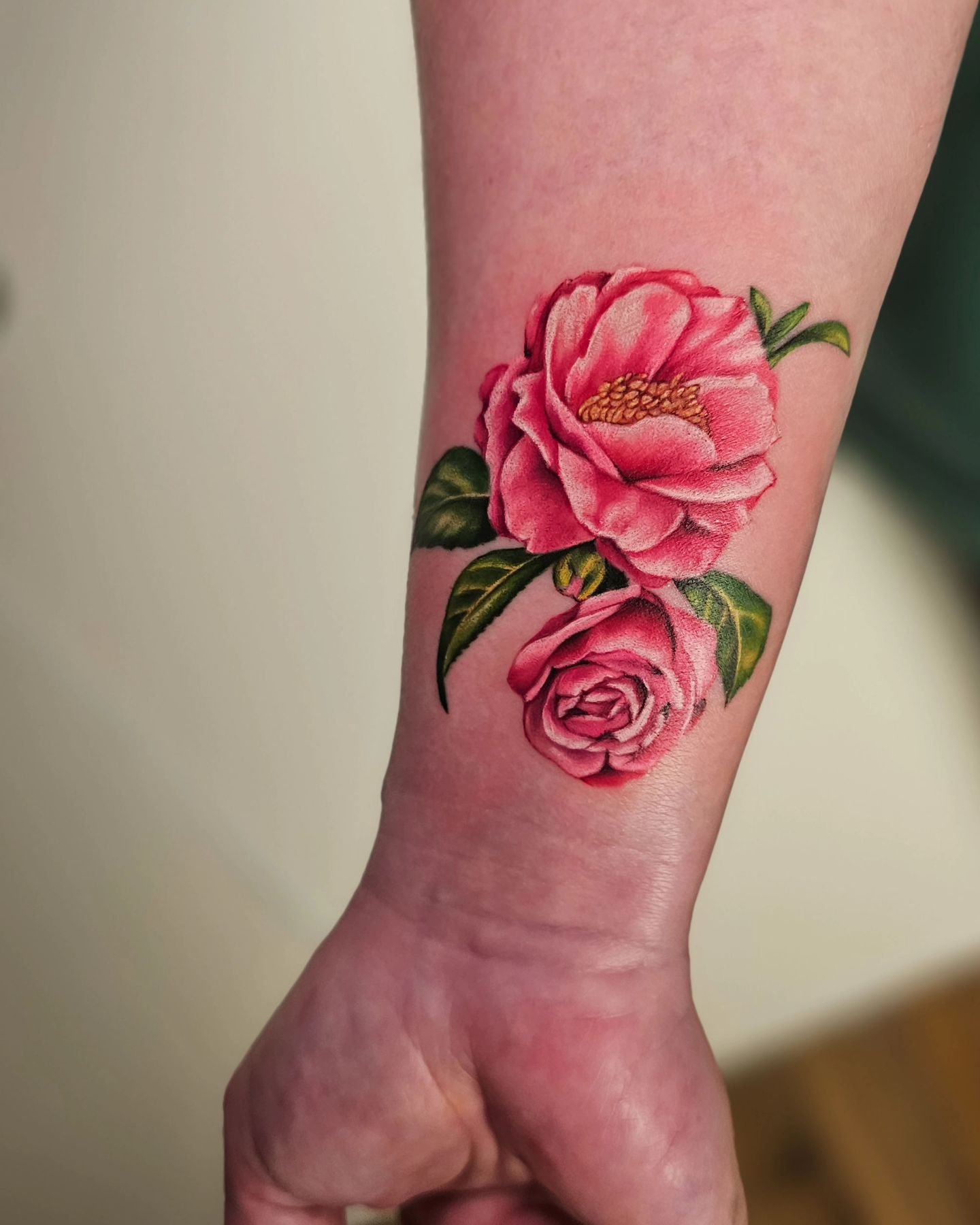 I got to tattoo my cousin for her birthday! These pink camellias are inspired by the ones that grew in Granny Nell's yard. Gran Nell spent a century on this earth. Most of that time was spent loving and taking care of others. Kids, grand kids, great 