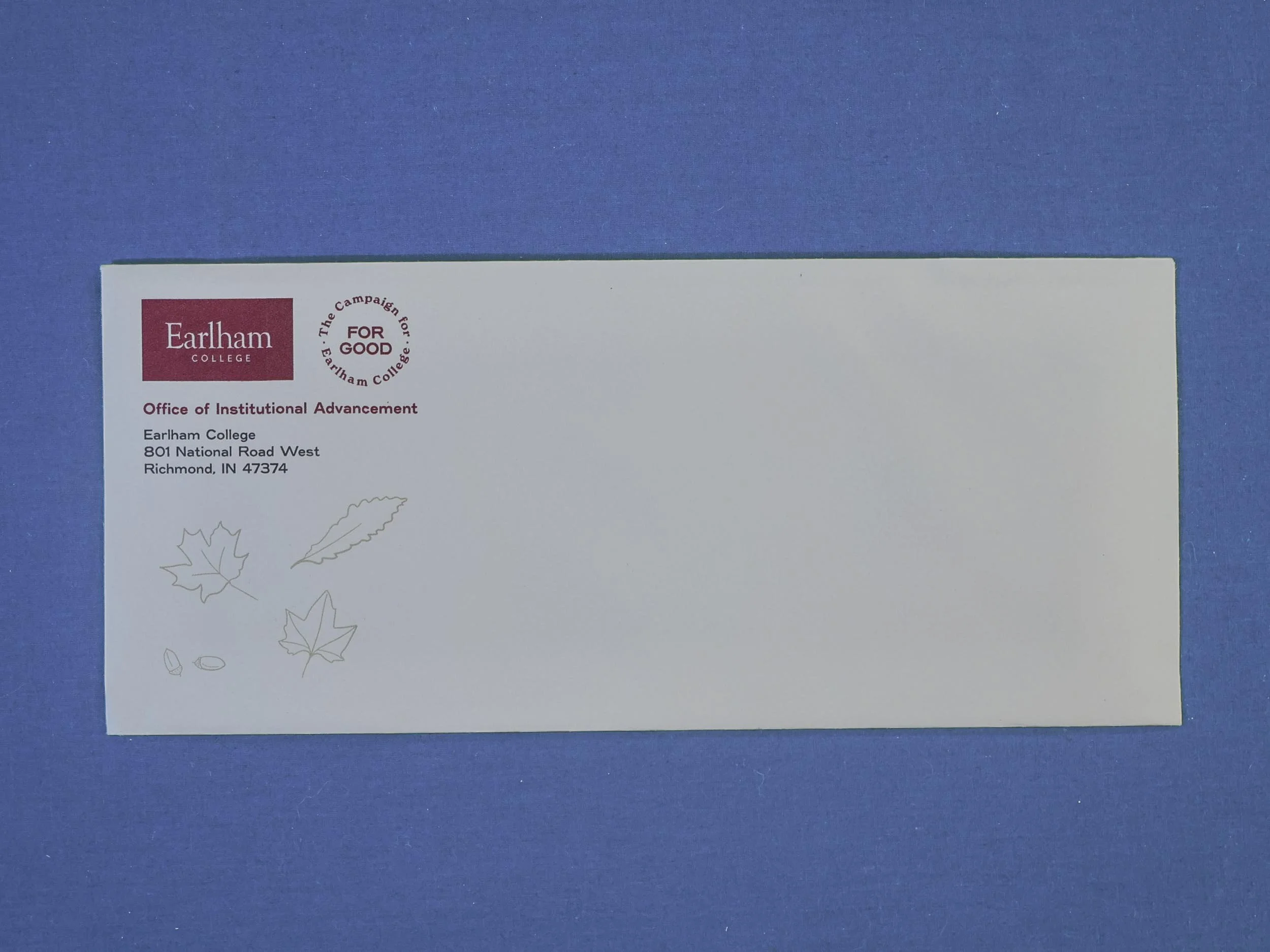 #10 envelope with Campaign logo and illustrated leaves