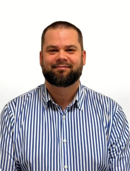 Dr Daniel Moore, Senior Counselling Psychologist at Resilient Wellbeing Clinic in Wimbledon, London