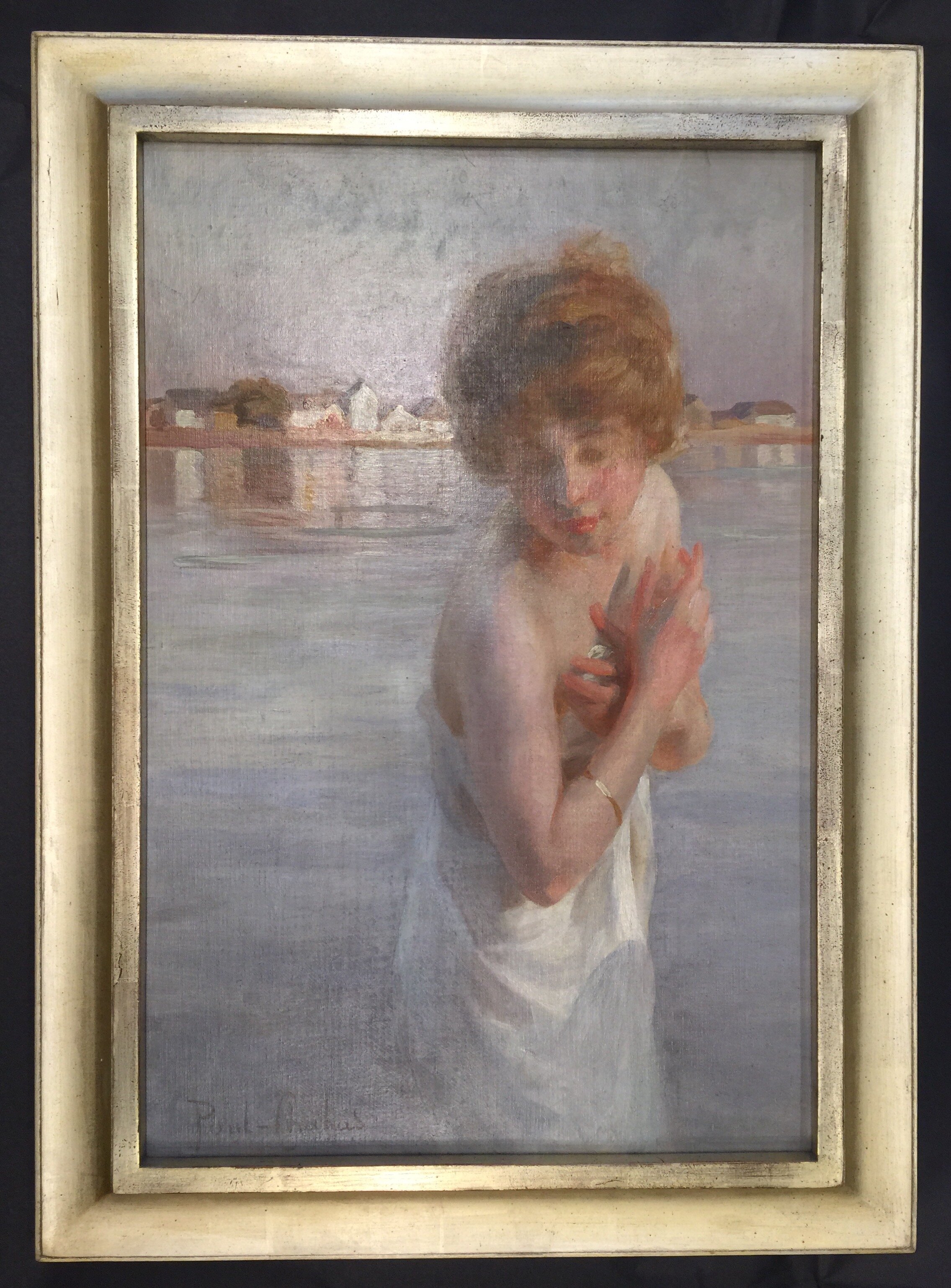 oil painting of a woman in a white gold frame