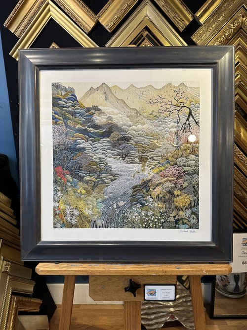 Whimsical digital landscape print, framed in a custom carved, blue hand stained 3 inch poplar frame