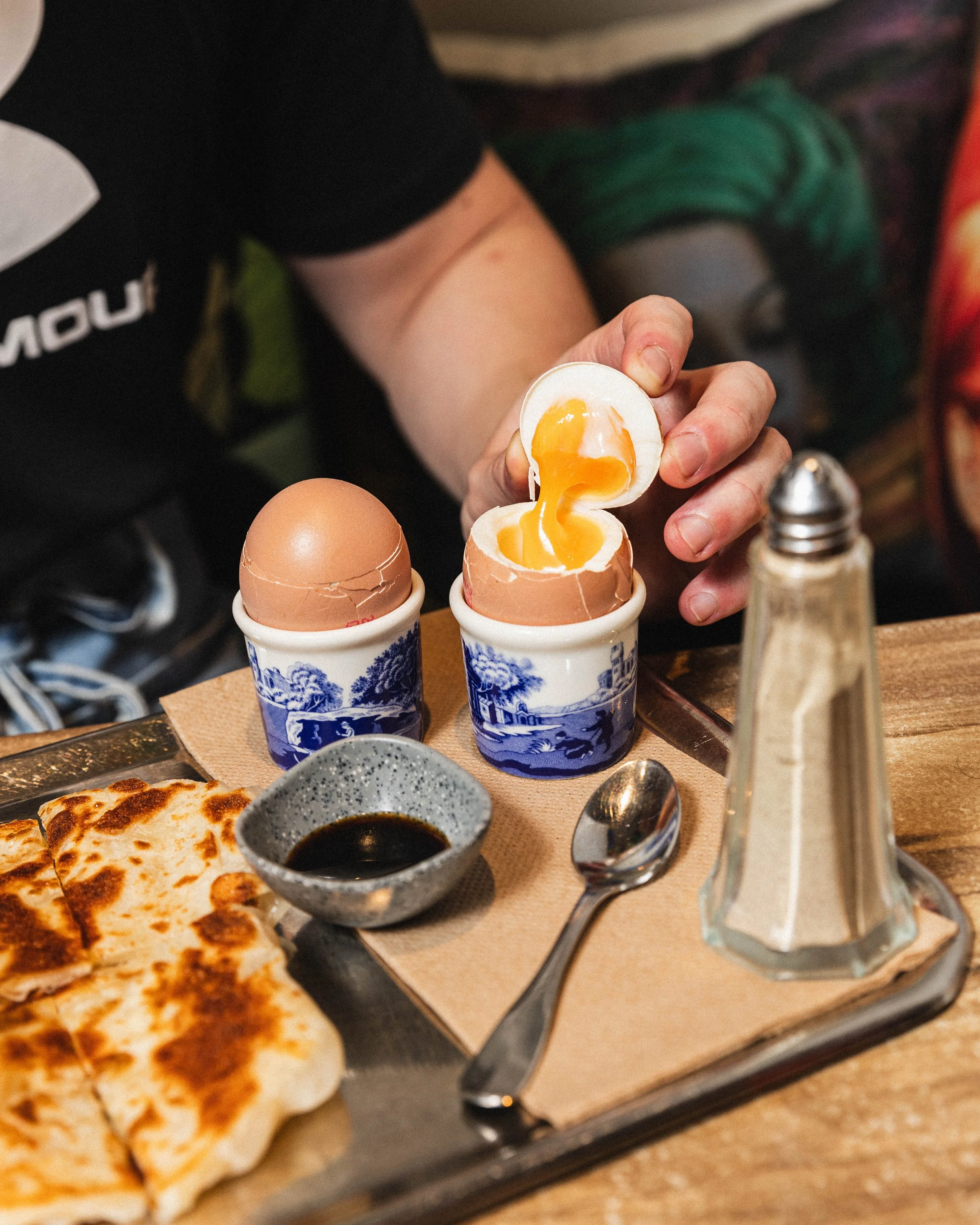 Our take on the Singapore breakfast classic. Very soft boiled eggs with roti soldiers, soy sauce and white pepper. Add chilli jam for a spicy kick
