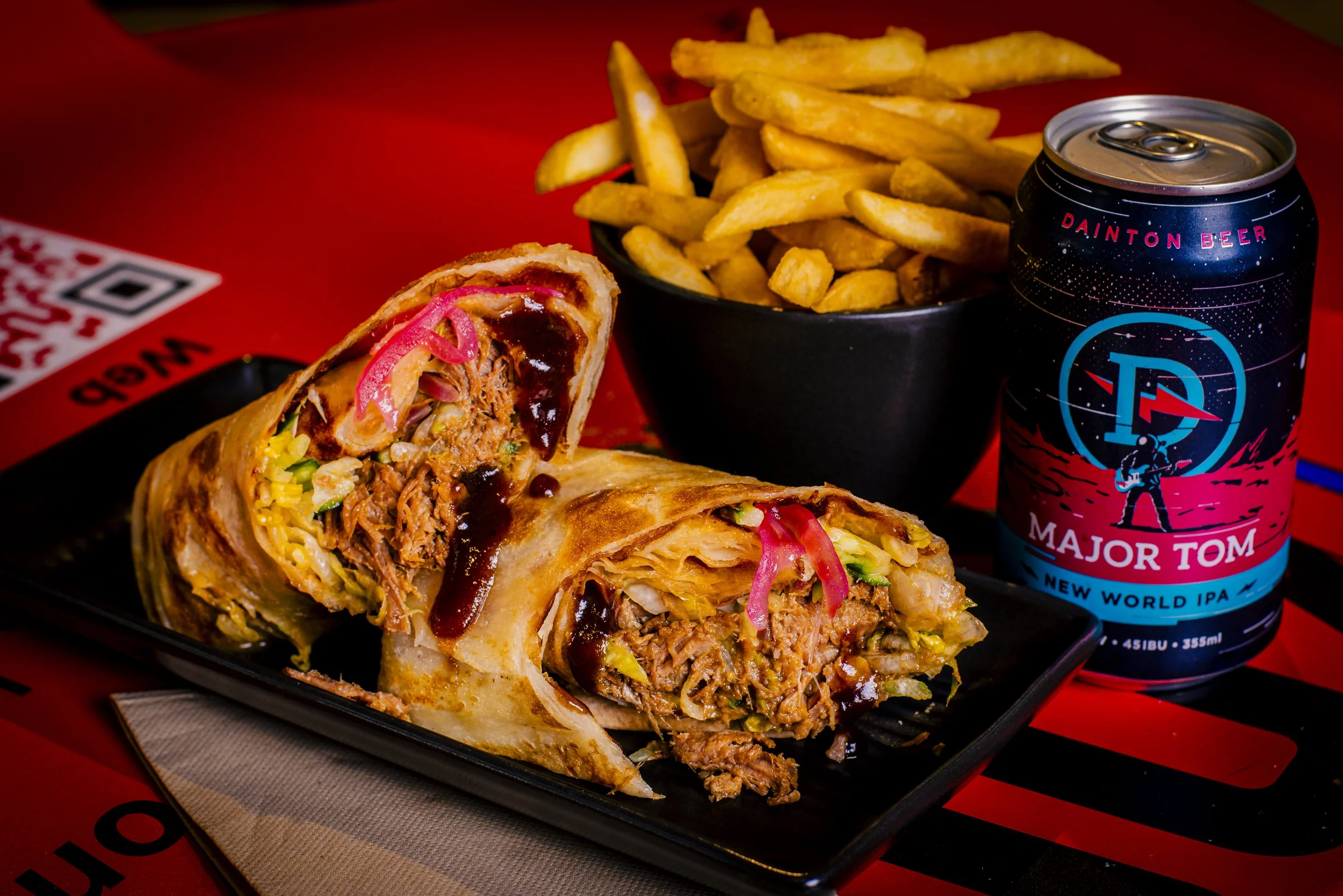 Beef rendang roti wrap with crispy curry leaves, chips and a Major Tom beer, at Kafe Kooks, Ultimo