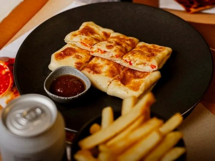 Roti telur, Malaysian roti filled with egg, onion and fresh chilli, with sambal, at Kafe Kooks, Ultimo