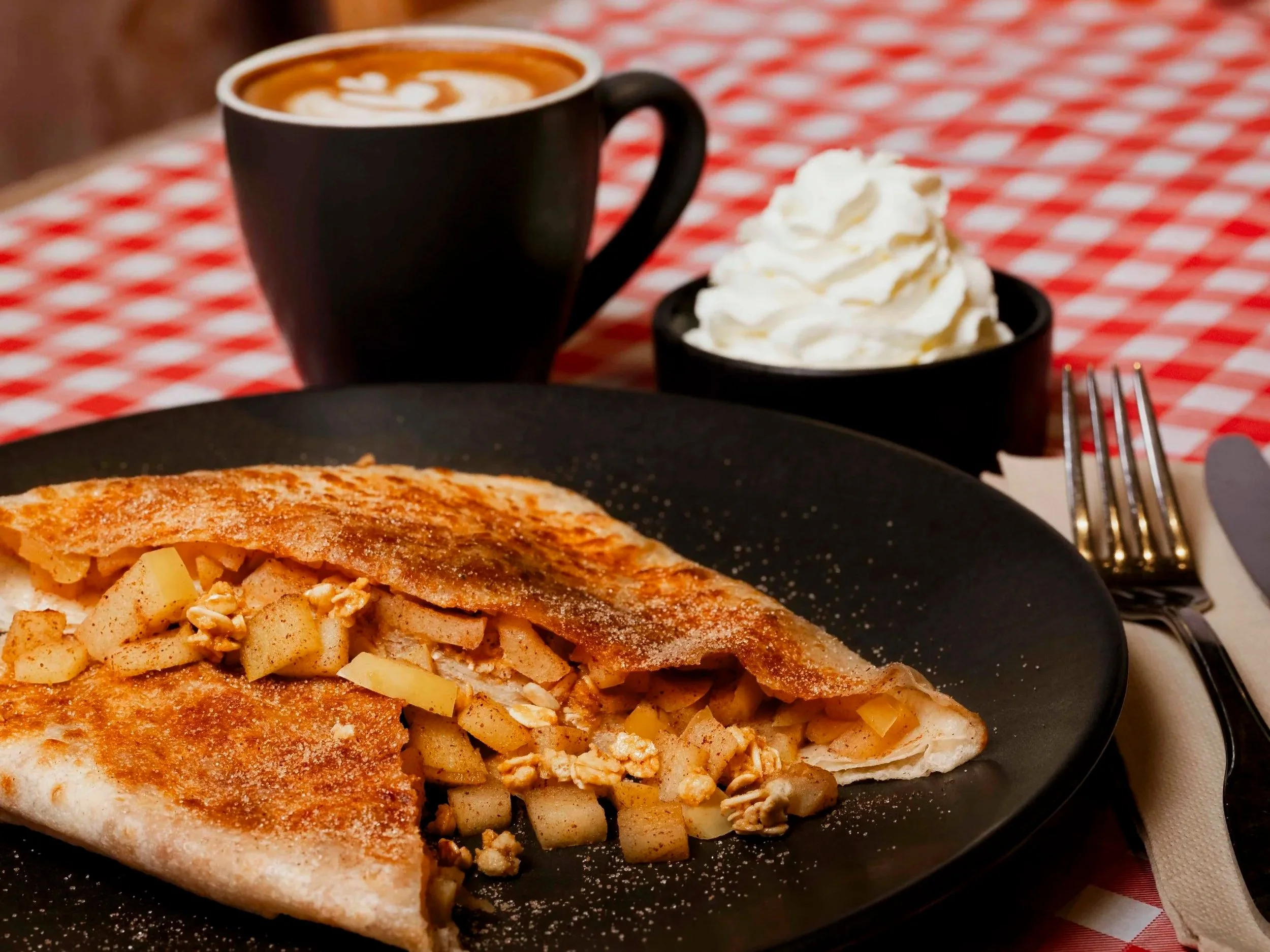 Apple crumble roti with whipped cream and a flat white, at Kafe Kooks, Ultimo