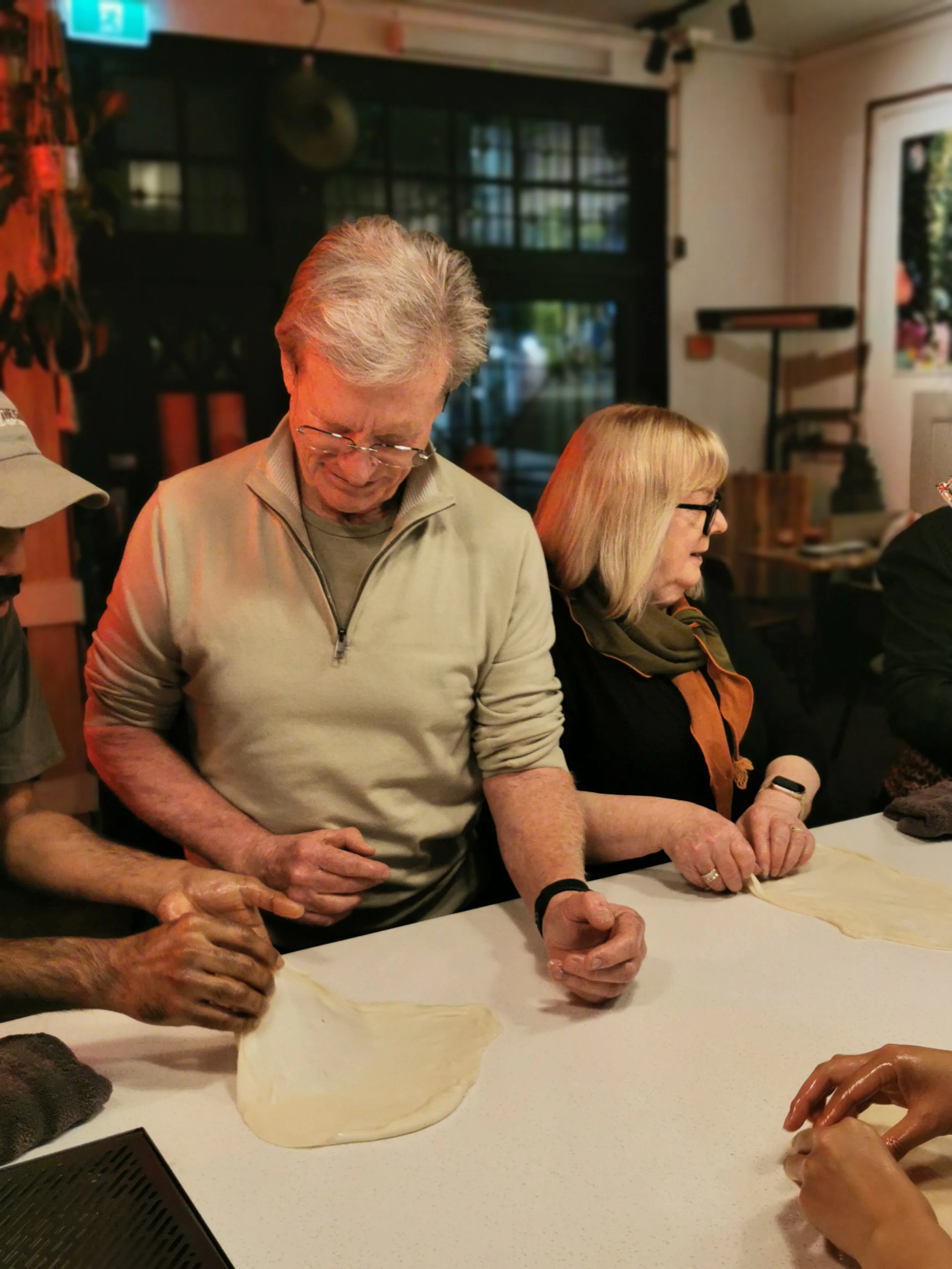 Learning to stretch roti dough thin at Sydney's Roti Masterclass