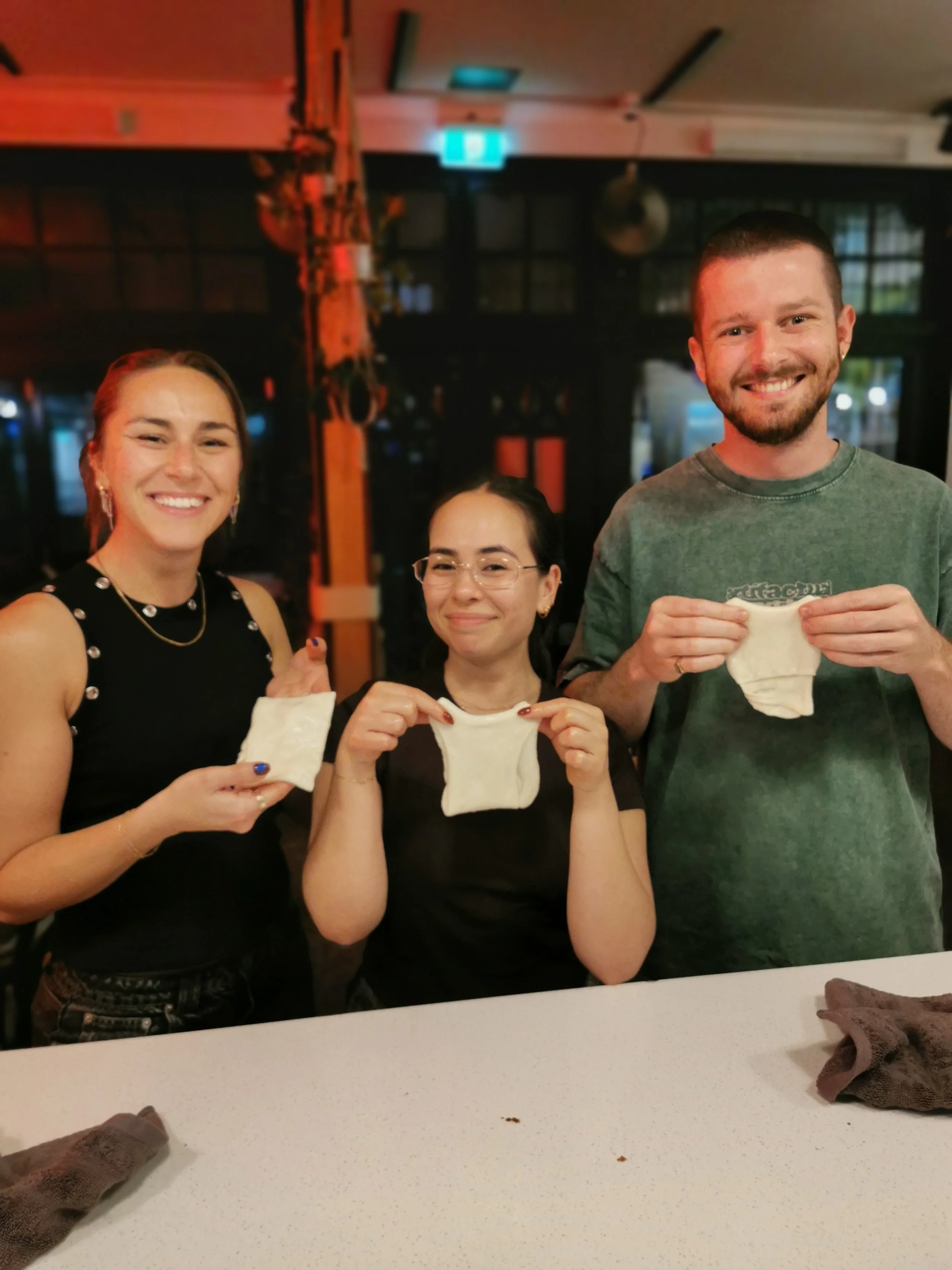 Guest celebrating their finished roti at Kafe Kooks, Ultimo Sydney