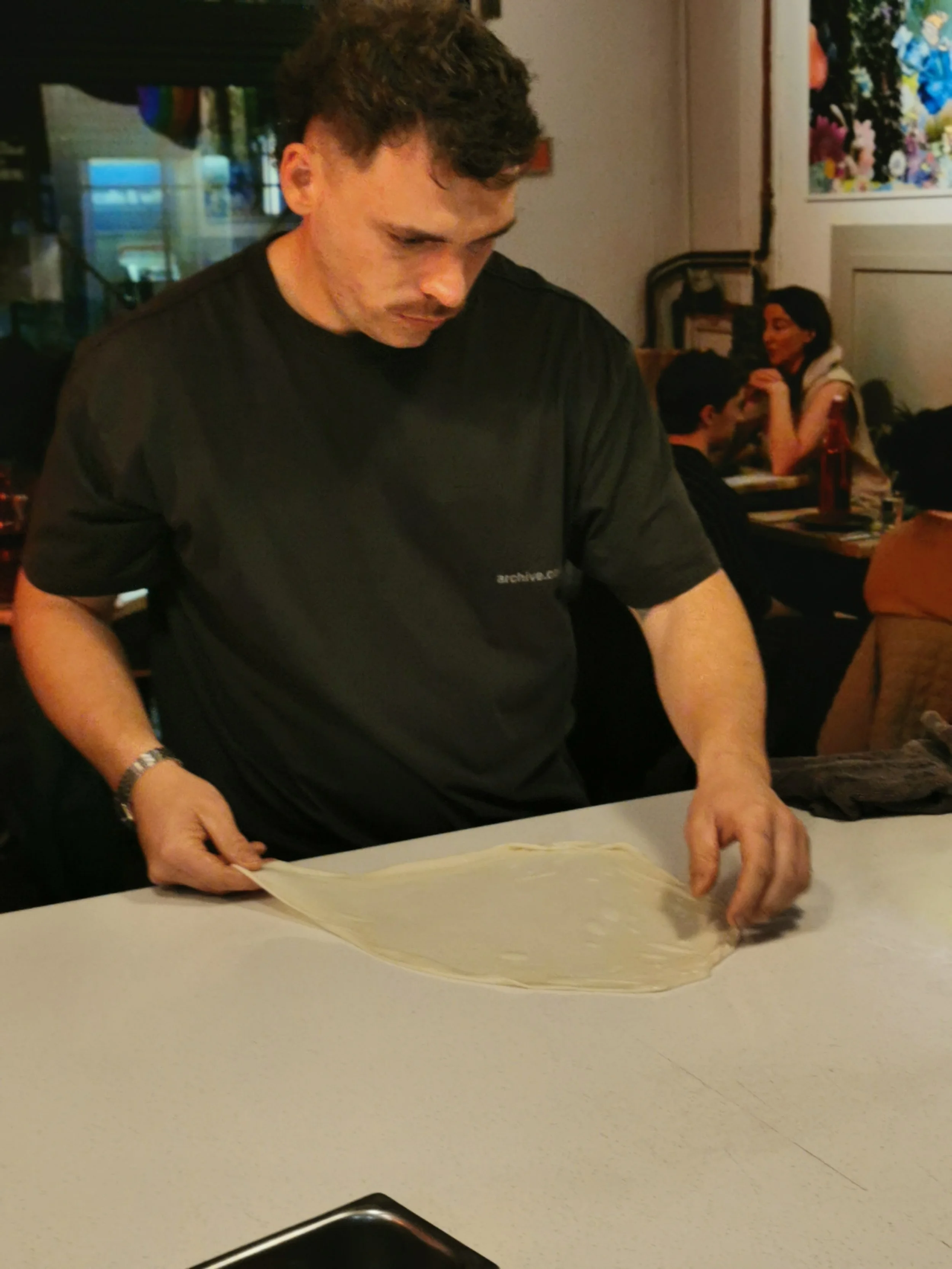 Stretching roti dough thin and translucent, Kafe Kooks Ultimo