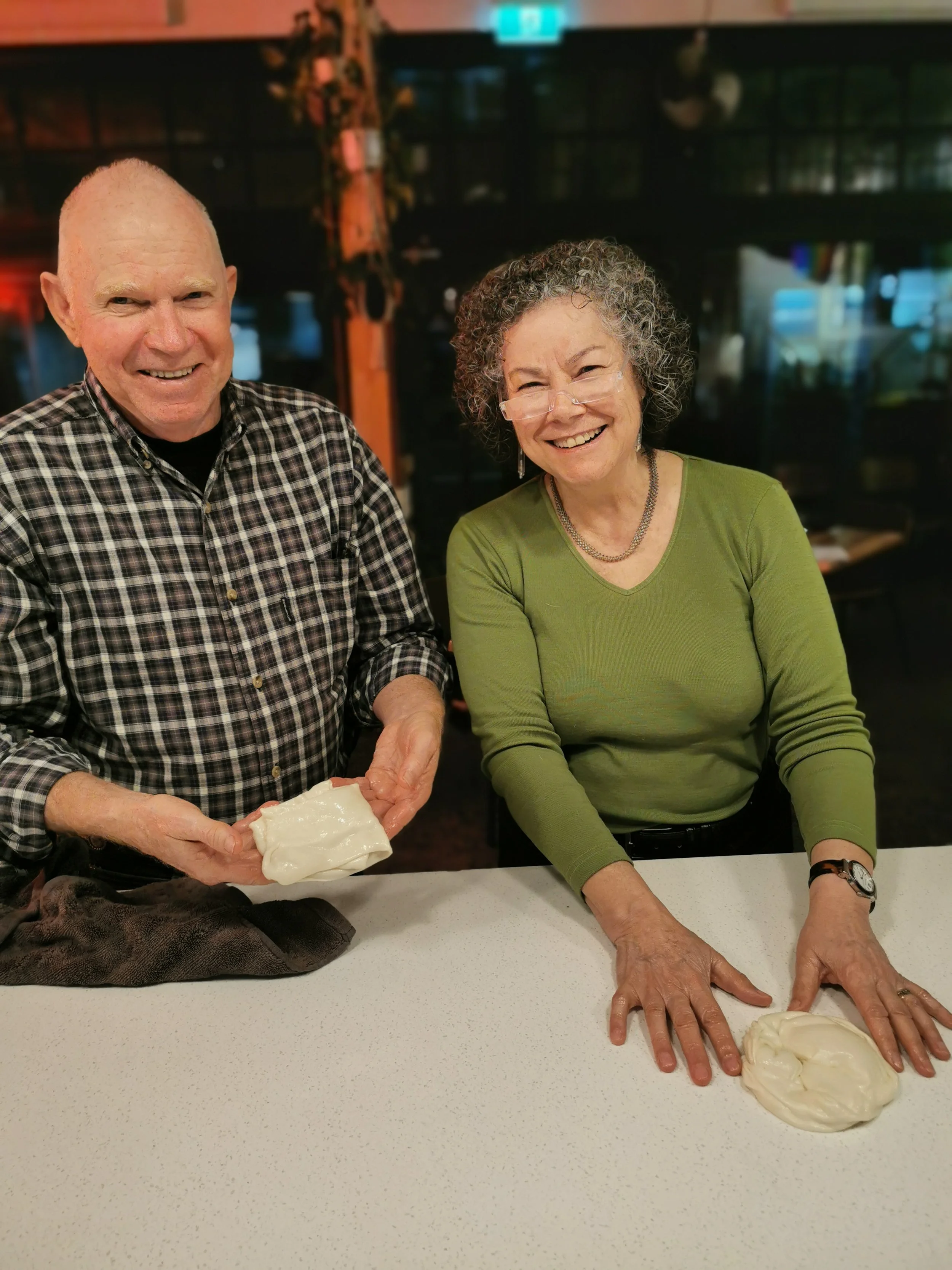 Proud guest with their first handmade roti at Kafe Kooks