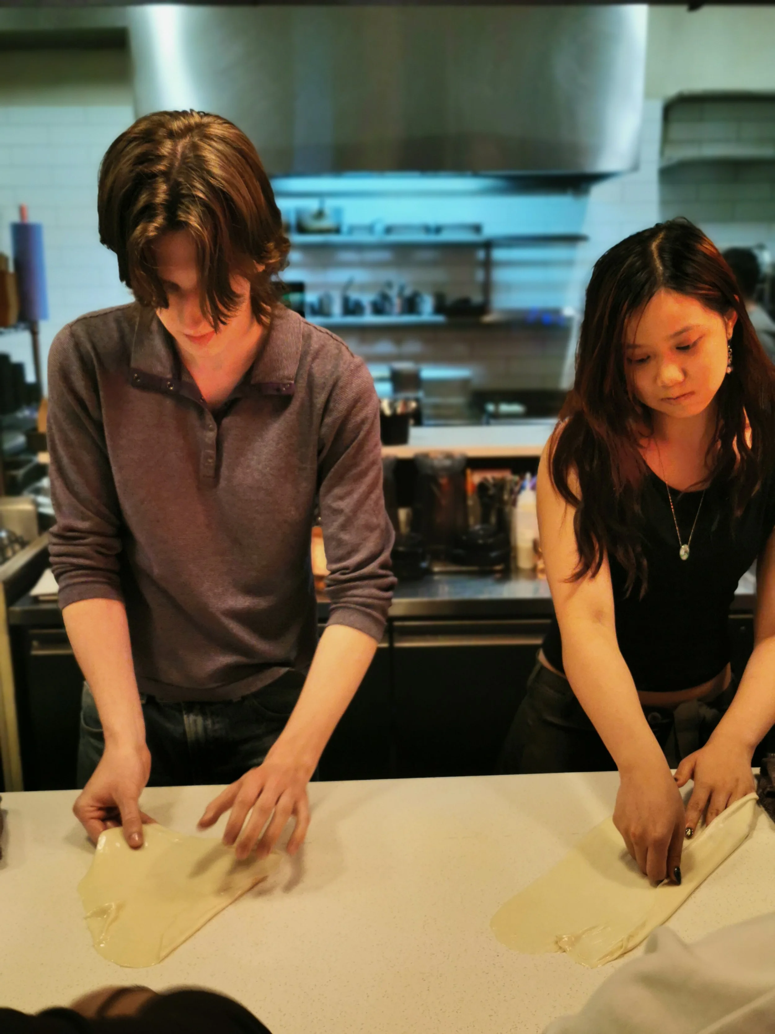 Guest stretching roti dough at Kafe Kooks Roti Masterclass, Ultimo Sydney