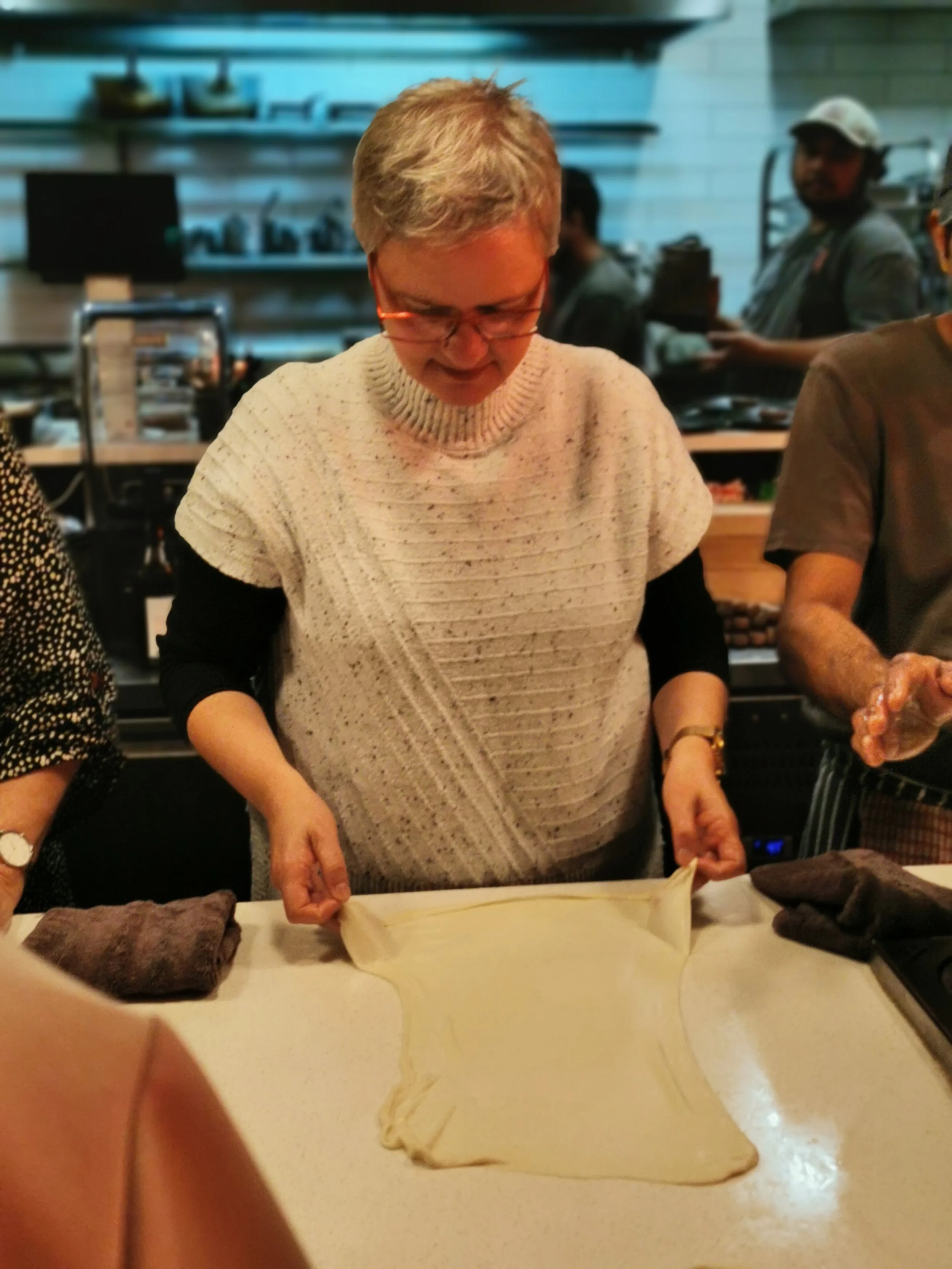 First-timer stretching roti dough at Sydney's only roti restaurant