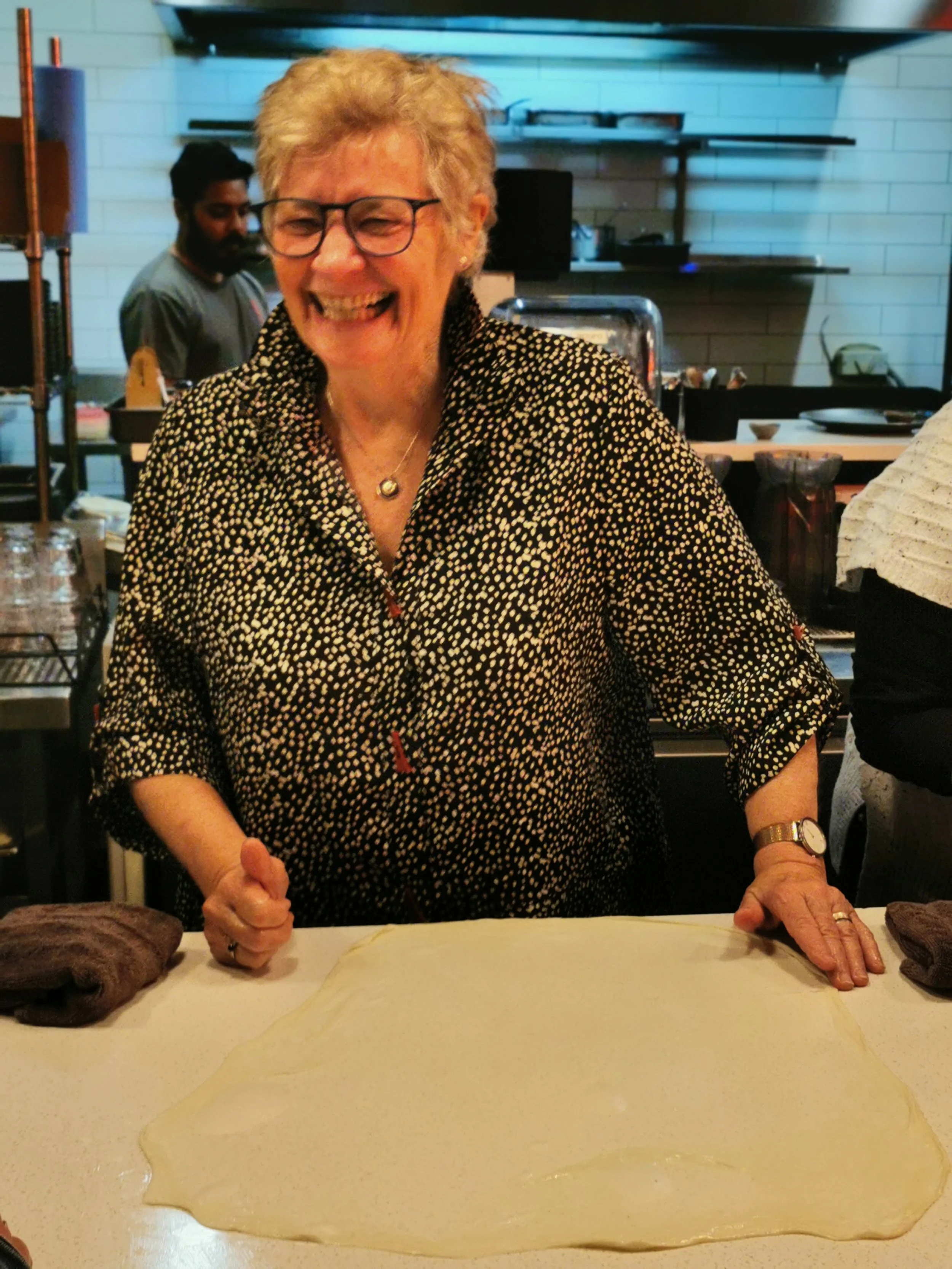 Learning to stretch roti dough thin at Sydney's Roti Masterclass