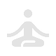 A person meditating in a cross-legged seated position