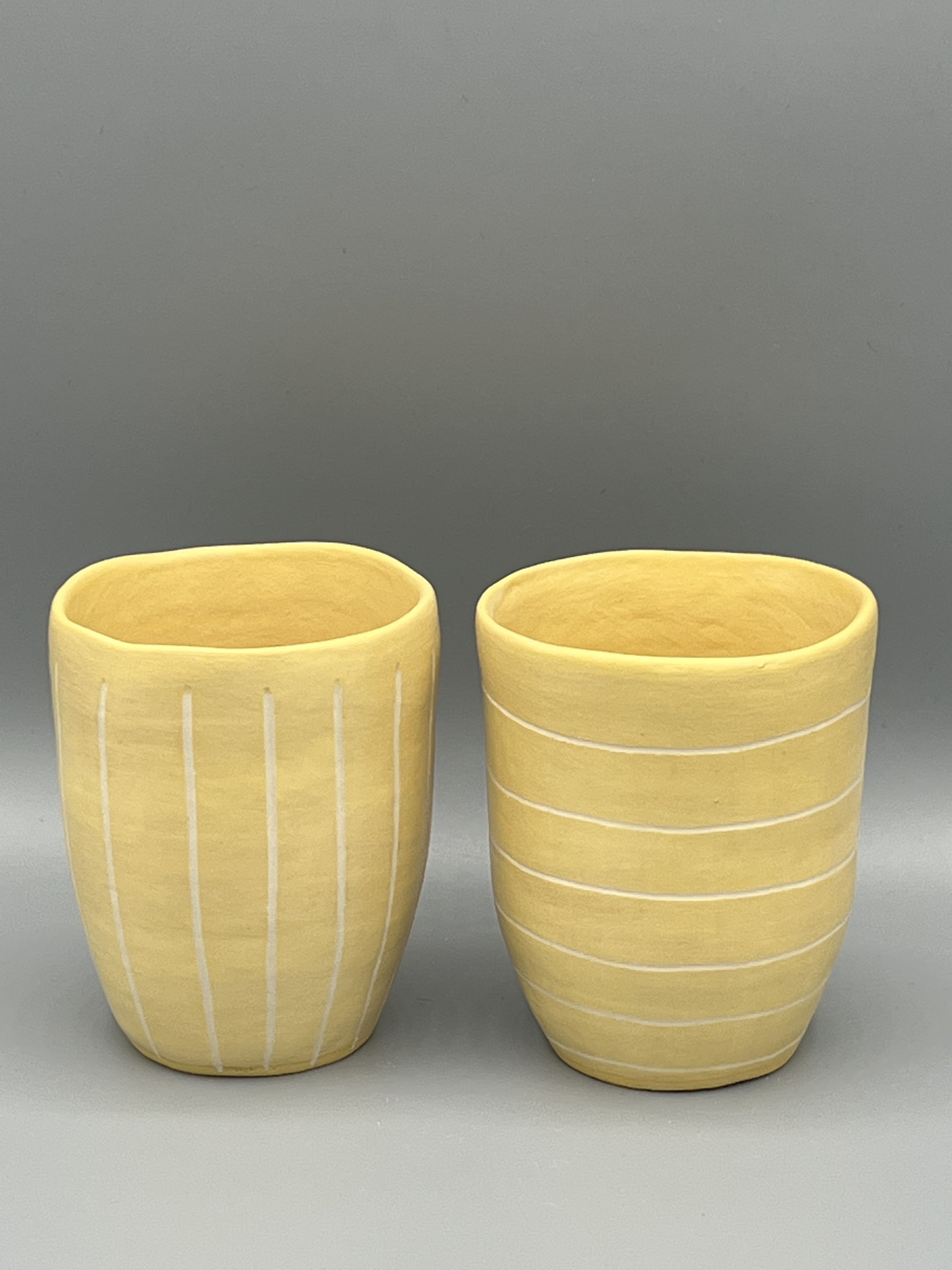 14_Pale ochre matt glazed_ Drinking vessle_ horizontal& Vertical_8x4.5_Group Shot.jpeg
