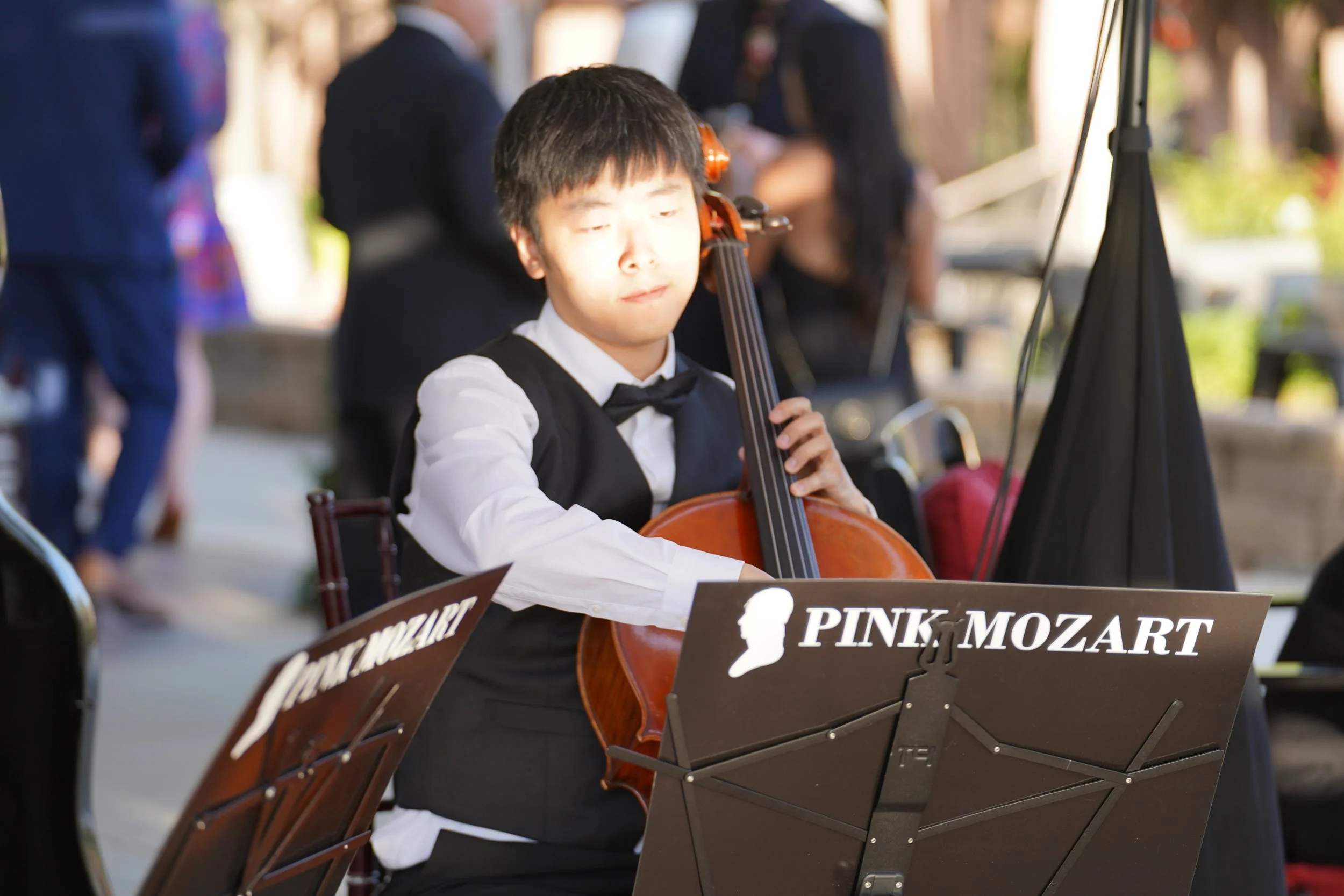 Pink Mozart cellist performing at Europa Village Wineries and Resort in Temecula