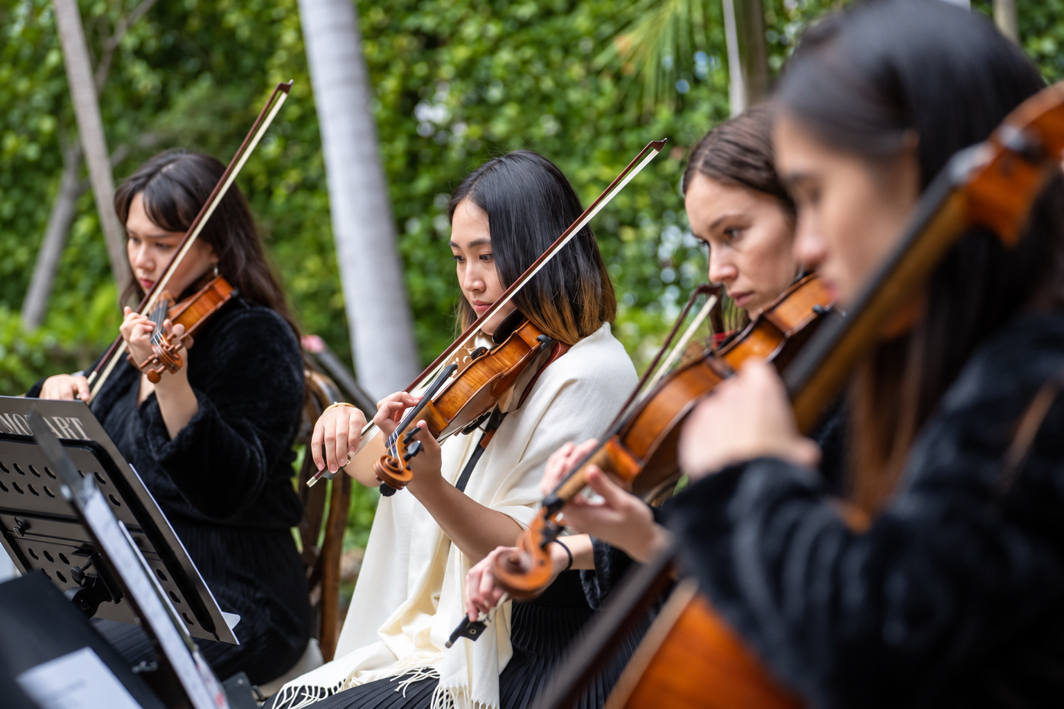 Pink Mozart violinists performing live wedding music at Vibiana in downtown Los Angeles