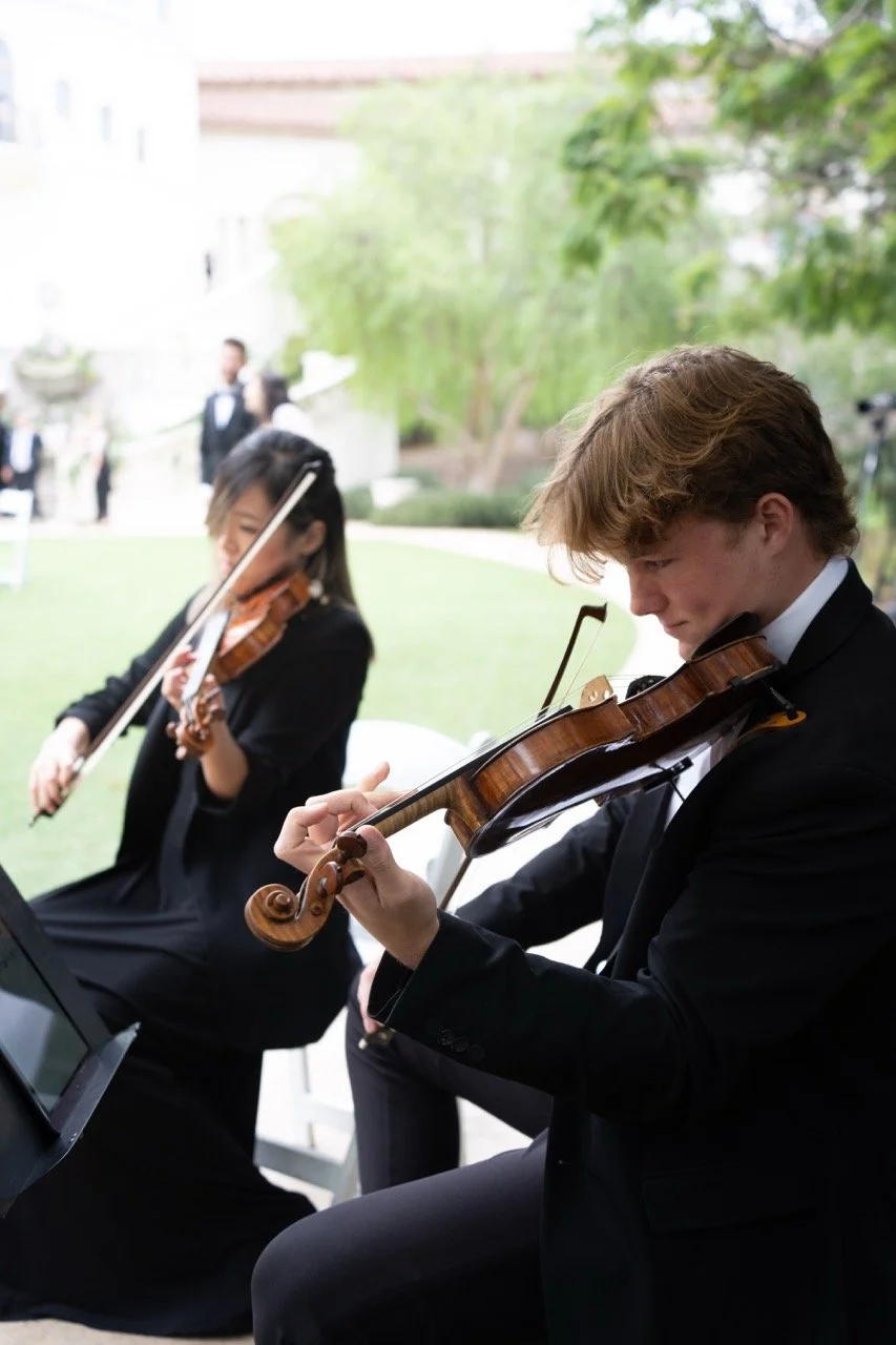 Pink Mozart string musicians performing at Waldorf Astoria Monarch Beach in Dana Point