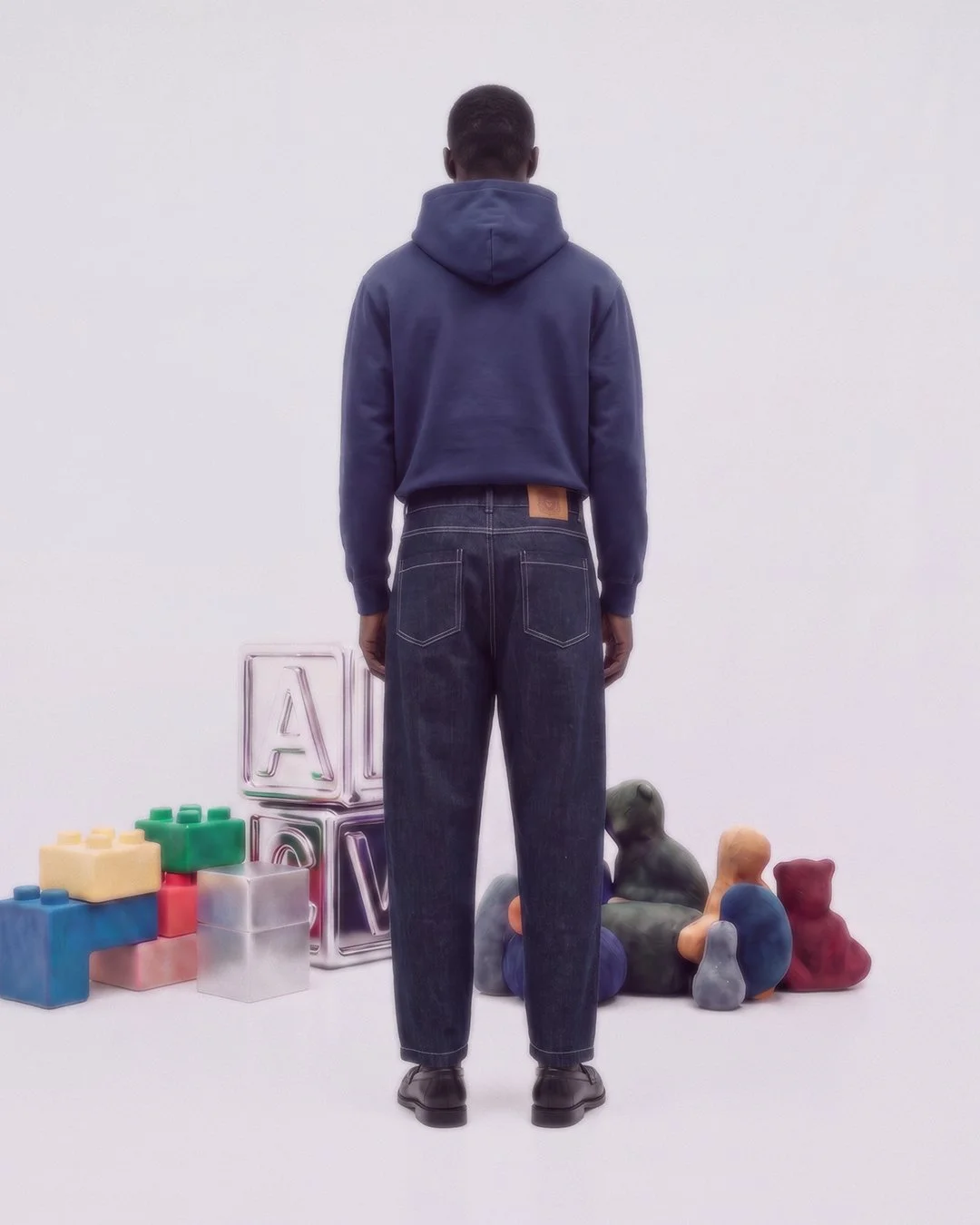 Male Model wearing Indigo hoodie by Artistrybeing