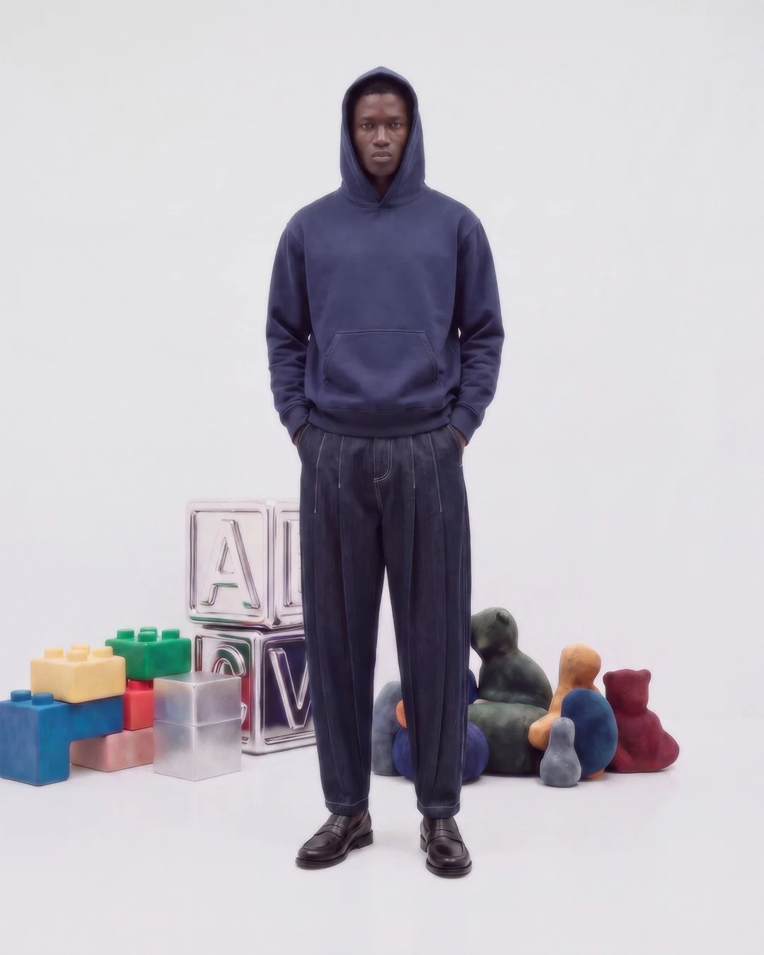 Male Model wearing Indigo hoodie by Artistrybeing
