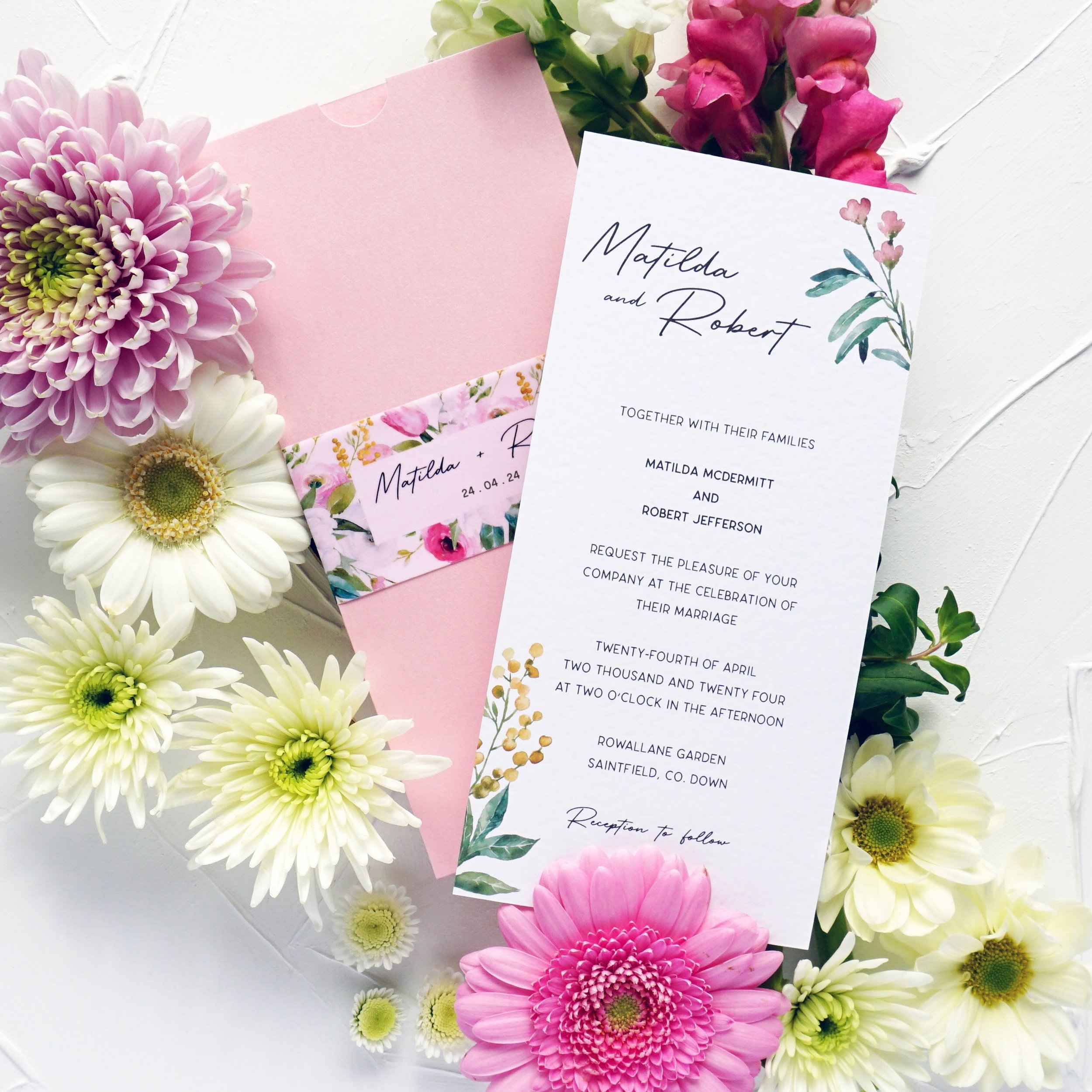 MATILDA - With hammered double sided cardstock, a luxury blush pink wallet and matching vellum belly band, you know you are getting the complete works with the Matilda suite. Perfect for spring/ summer weddings, with delicate floral accents and brigh