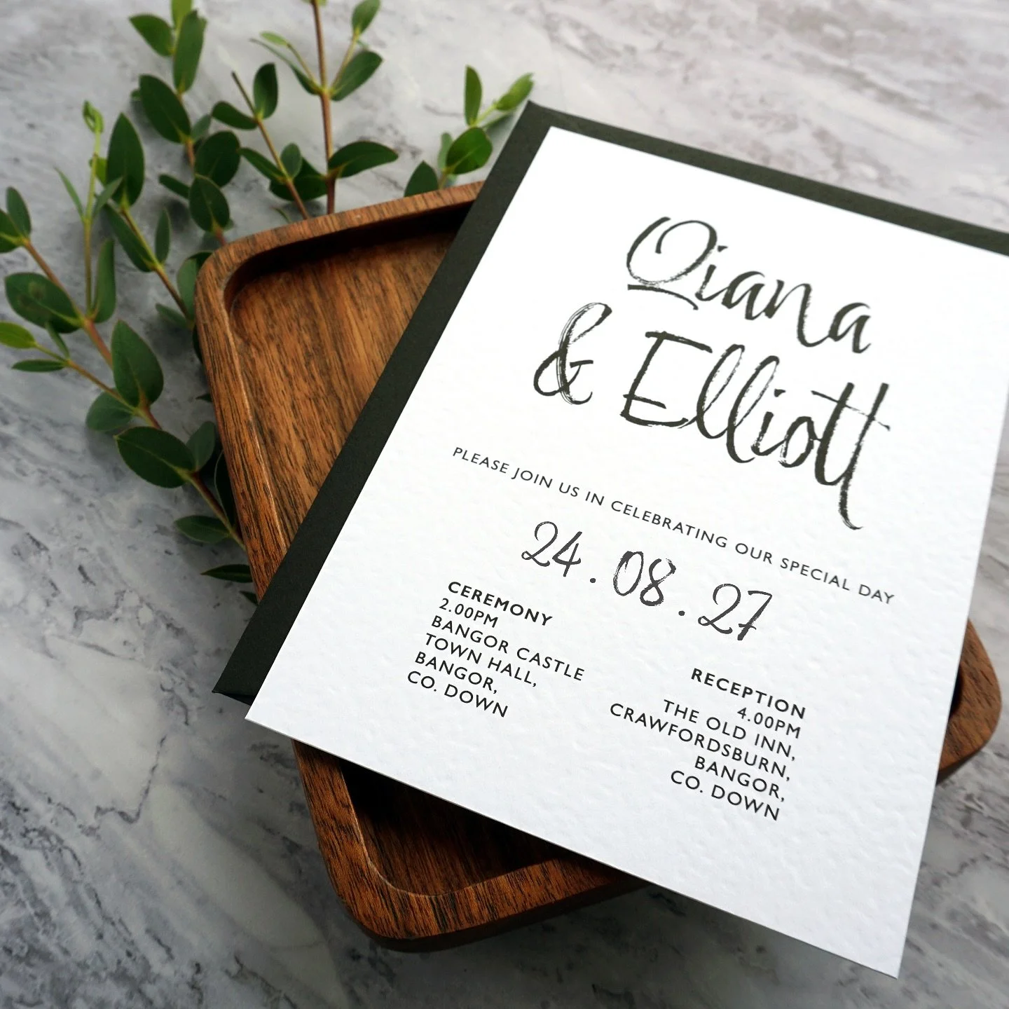 QIANA - Italian cardstock, jet black envelope, and a brush of love… every detail designed in monochrome magic. From the soft texture of the paper to the bold simplicity of black and white, this invitation captures a vision that’s modern,