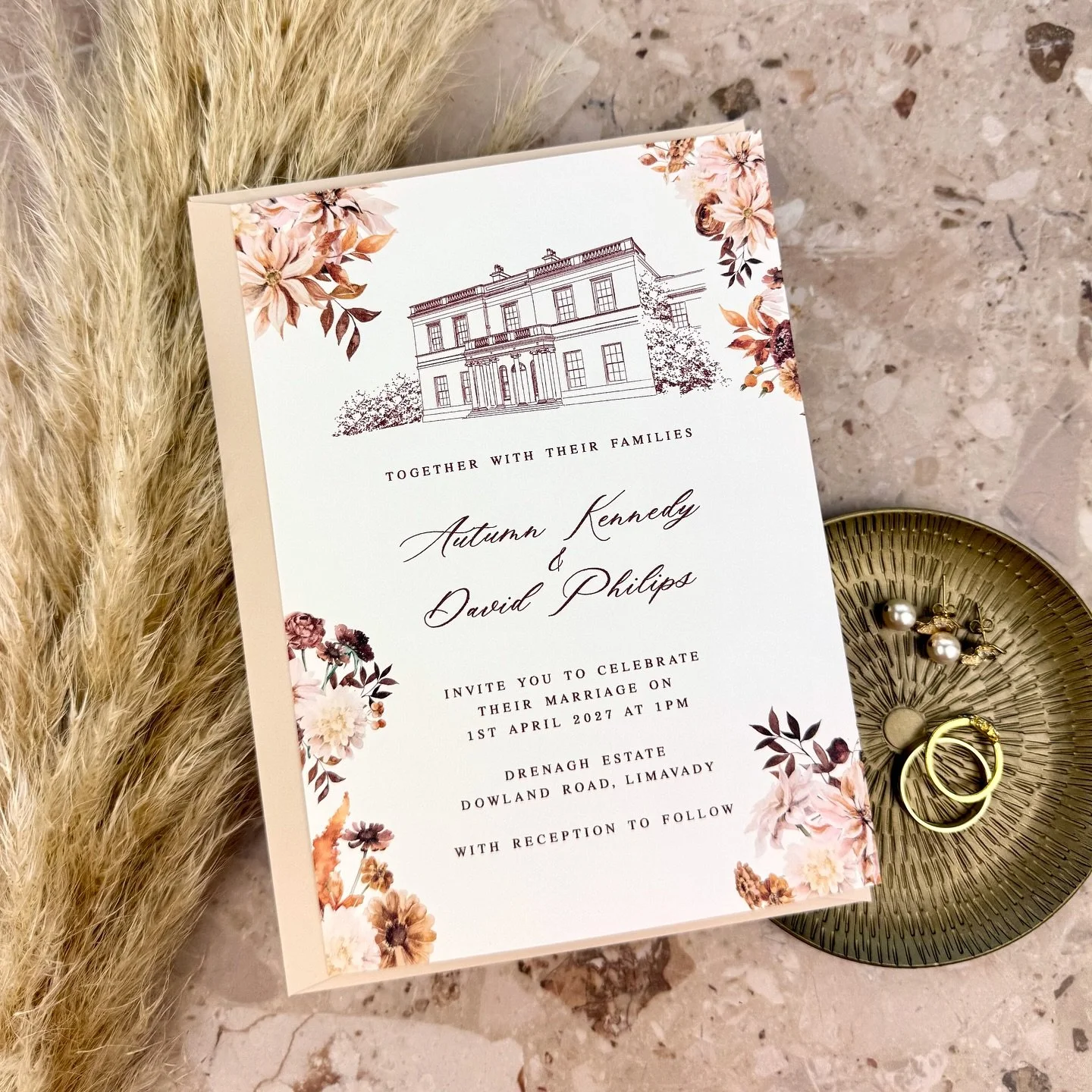 AUTUMN - Say hello to our newest love story on paper, the Autumn Suite. Rich florals in burgundy, mocha, and toffee meet elegant typography and your very own custom venue illustration. Pair with a buttermilk envelope for timeless charm, or go bold wi