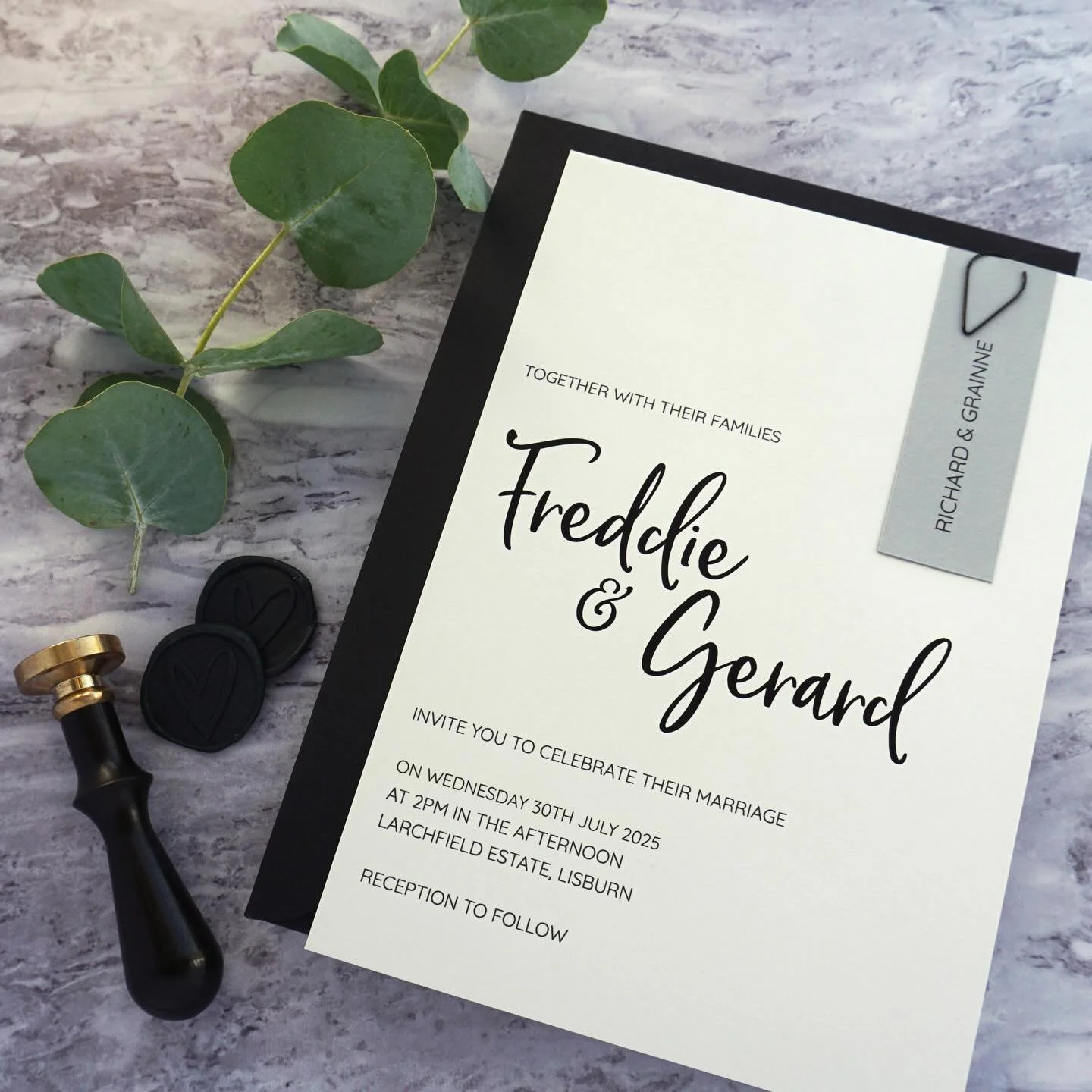 FREDDIE - With stunning black foiling, soft grey cardstock and a personalised guest tag, this invite just screams luxury. If you want to make a statement then this suite is for you, paired with a jet black envelope and teardrop clip for some extra dr