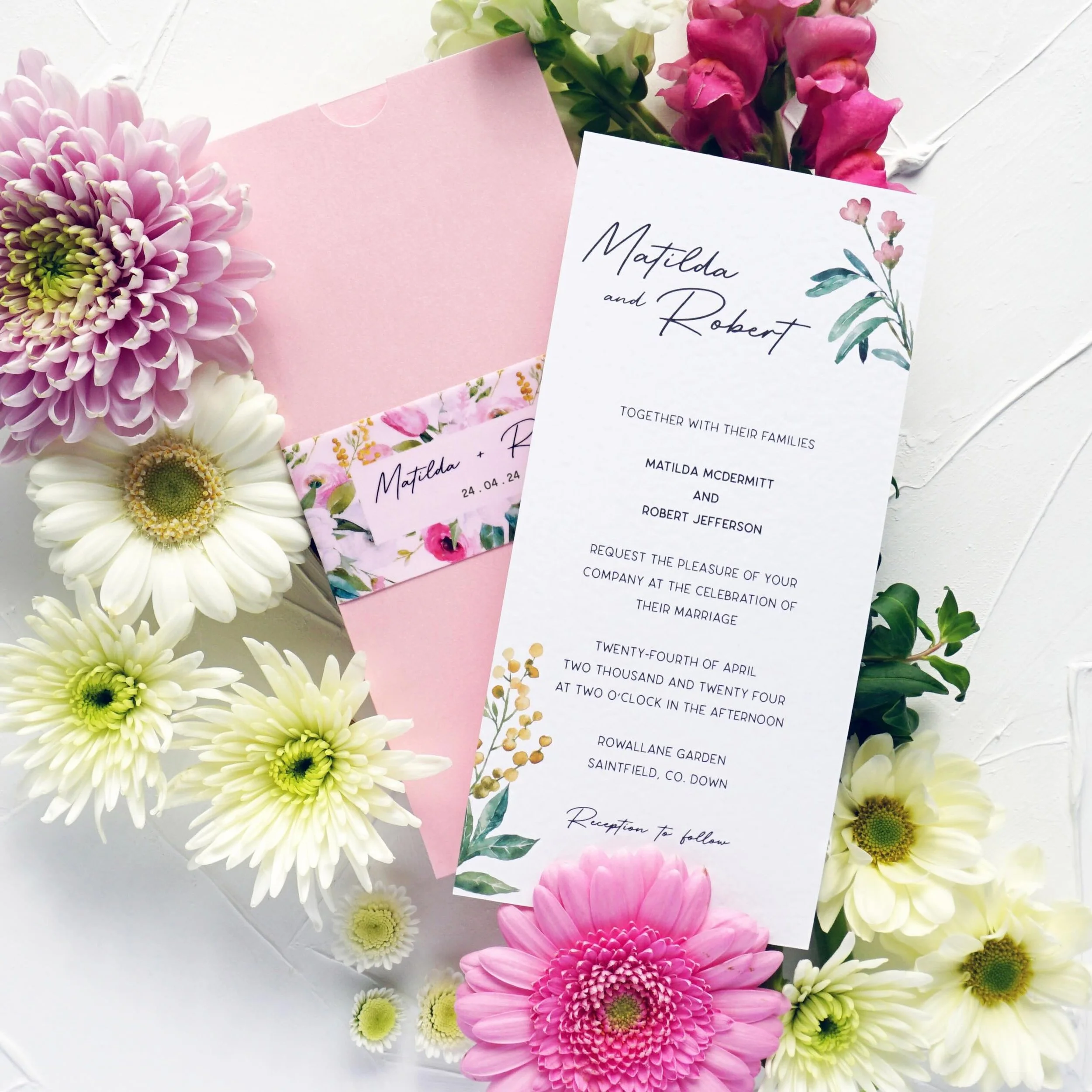 MATILDA - With hammered double sided cardstock, a luxury blush pink wallet and matching belly band, you know you are getting the complete works with the Matilda suite. Perfect for spring/ summer weddings, with delicate floral accents and bright colou